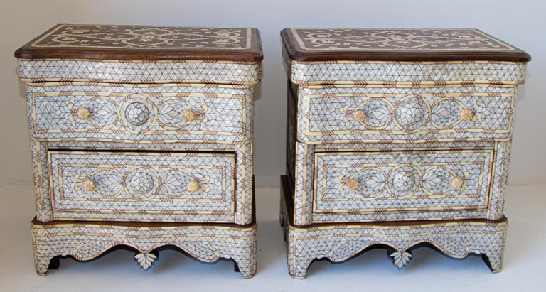 Fabulous Middle Eastern Syrian style Moroccan nightstands.
Pair of handcrafted contemporary Moorish Moroccan dresser with two drawers, wood inlay with white mother of pearl.
Moorish arches and intricate Islamic inlaid designs.
Dowry chest of drawers