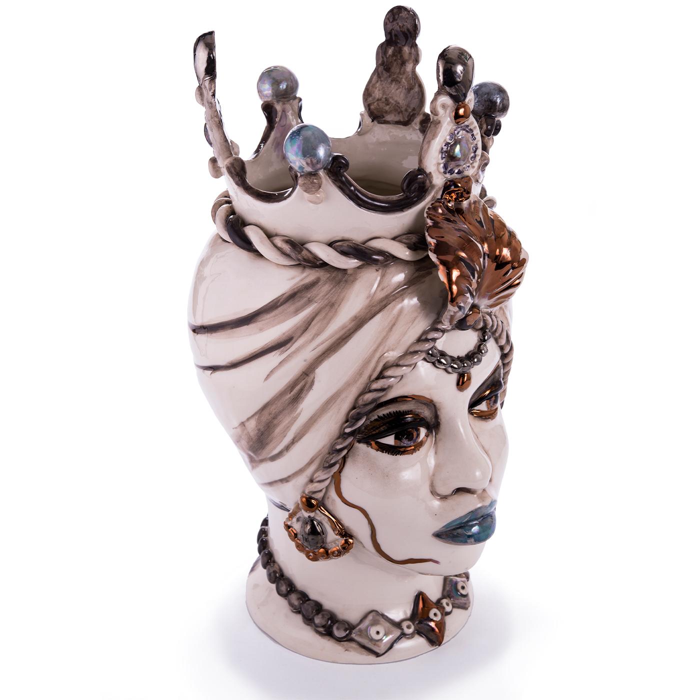 The Moor's head vase is an iconic Sicilian ceramic inspired by a legend of love and revenge between a Moor and a maiden which dates back to the period of the Arab occupation in Sicily. This exquisite modern interpretation of the traditional Sicilian