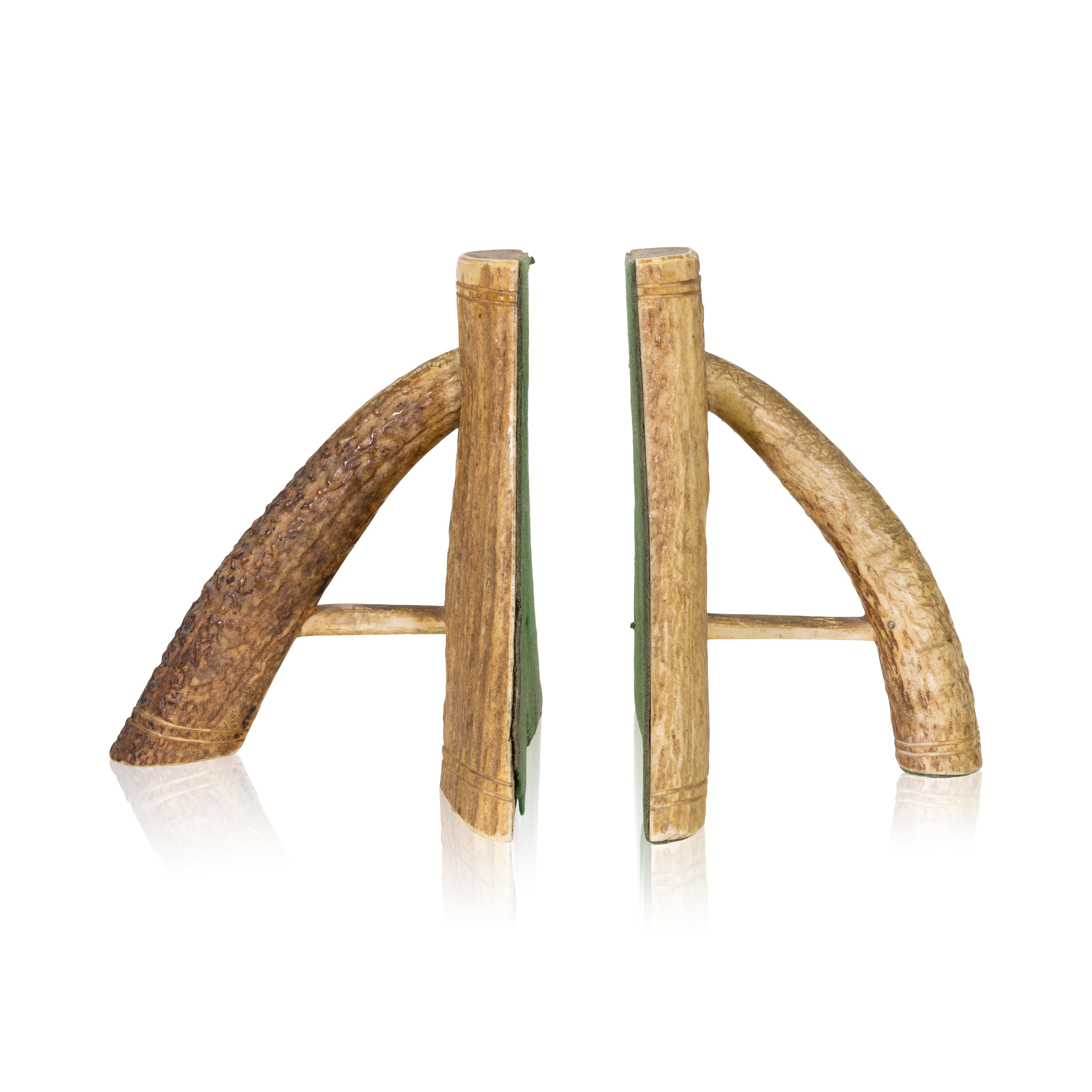 Moose antler bookends or candle holders from Wyoming. Goes great with our other antler furniture and accessories. 

Period: First quarter 20th Century

Origin: United States, Wyoming

Size: 5