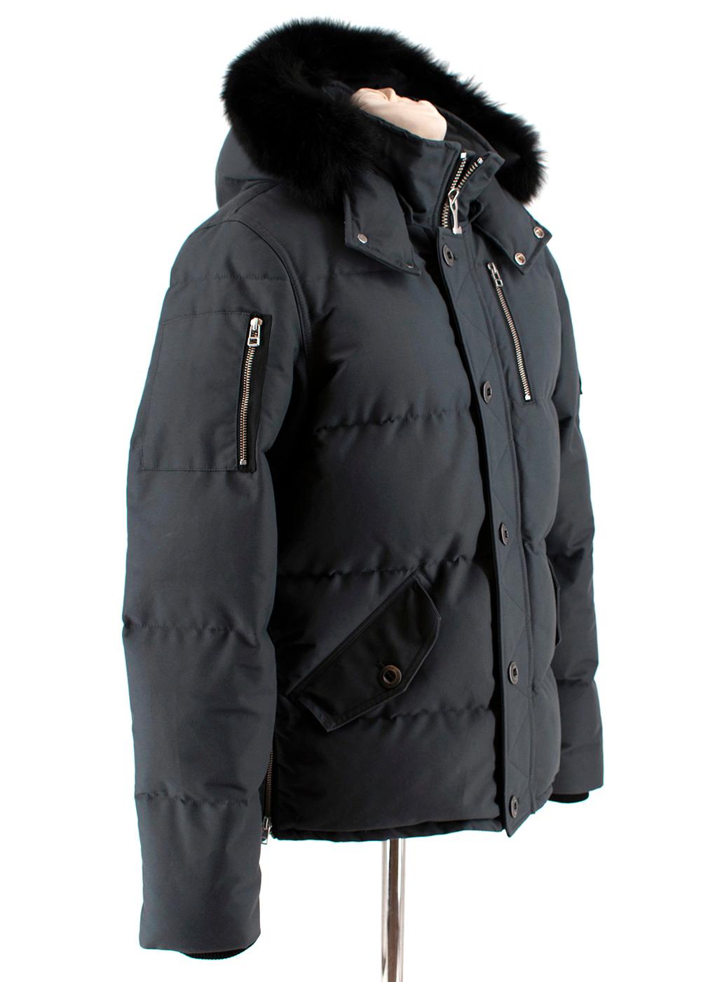Moose Knuckles 3Q Padded Puffer Jacket

- Detachable fur lined hood
- Slim cut
- Rib knit storm cuffs
- Four external hand warmer pockets
- Internal and shoulder zipper pockets
- Zipper adjustable side seams
- Signature reinforced buttons
- Water