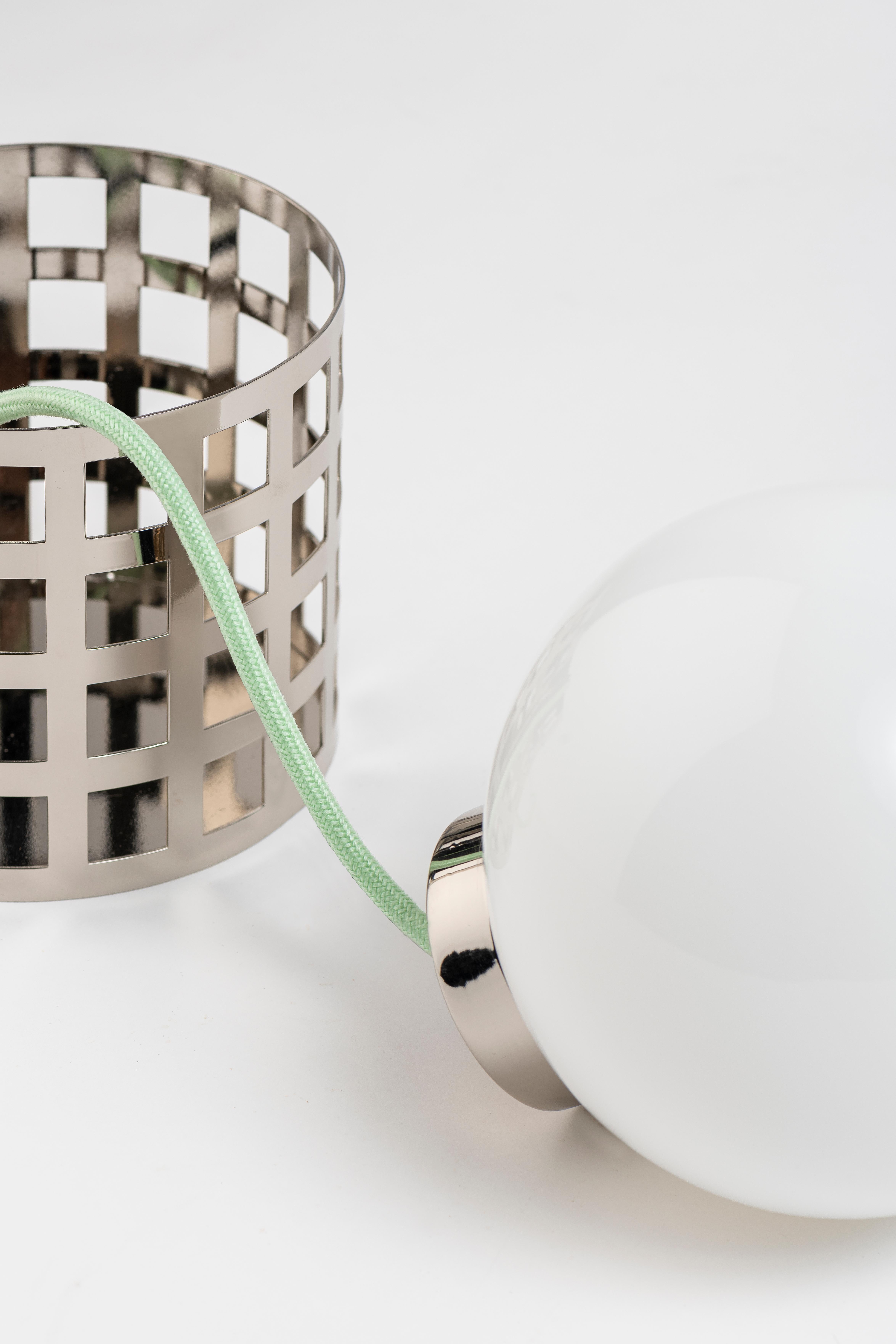 The archetype of modern lighting. Innovative, adaptable and performative. With a removable opal glass globe light and a practical on/off switch, its curves make it a true work of art that will effortlessly enhance any interior decor style. Don’t
