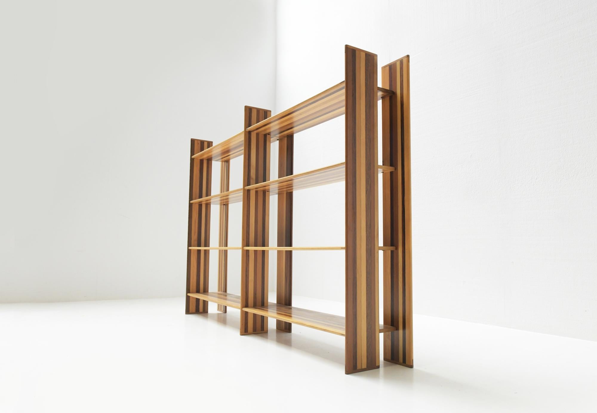 Stunning modular MOP bookcase/room divider.
Designed by Afra e Tobia Scarpa for Molteni, Italy.

Mop is the second life of an exquisite material: wood. Scraps from veneer making are used to create a new piece of furniture with two elements - a shelf