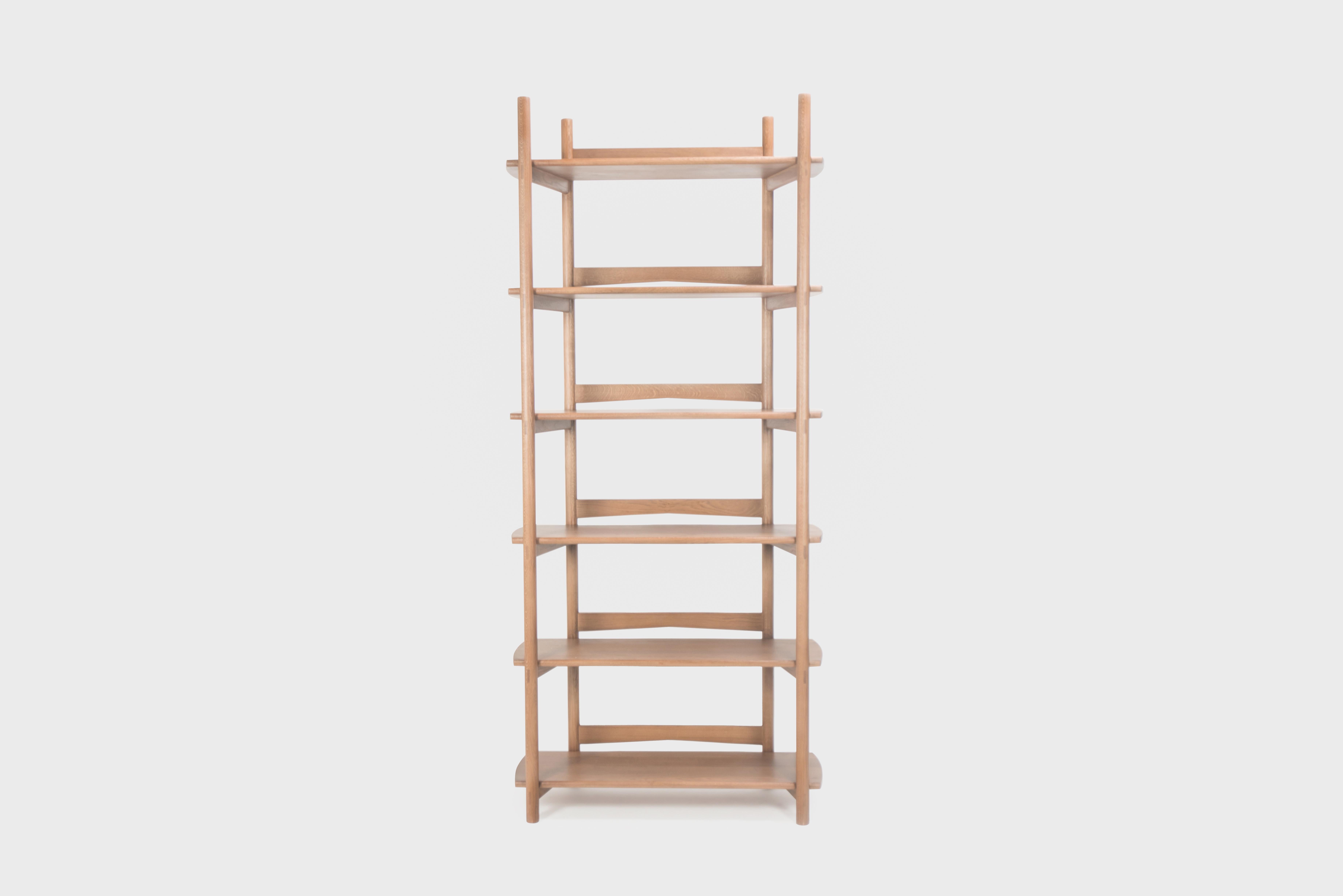 Built from solid FSC® Certified white ash, finished in our house-made tenna oil, and handcrafted using traditional joinery techniques with exposed tenons visible throughout. Its design is both utilitarian and unique, with winged back detailing