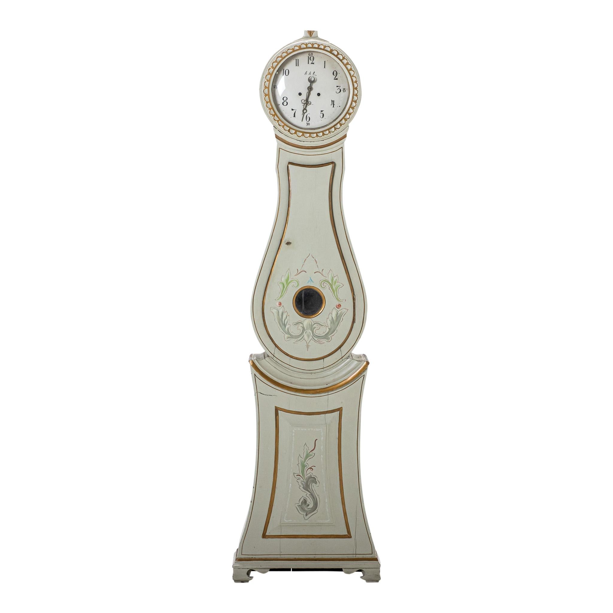 Antique Mora Clock 1800s with original floral paint details and gilding. Face inscribed AAL. Original longcase clock mechanism with weights and pendulum. 
Measures: Height: 206cm/81
