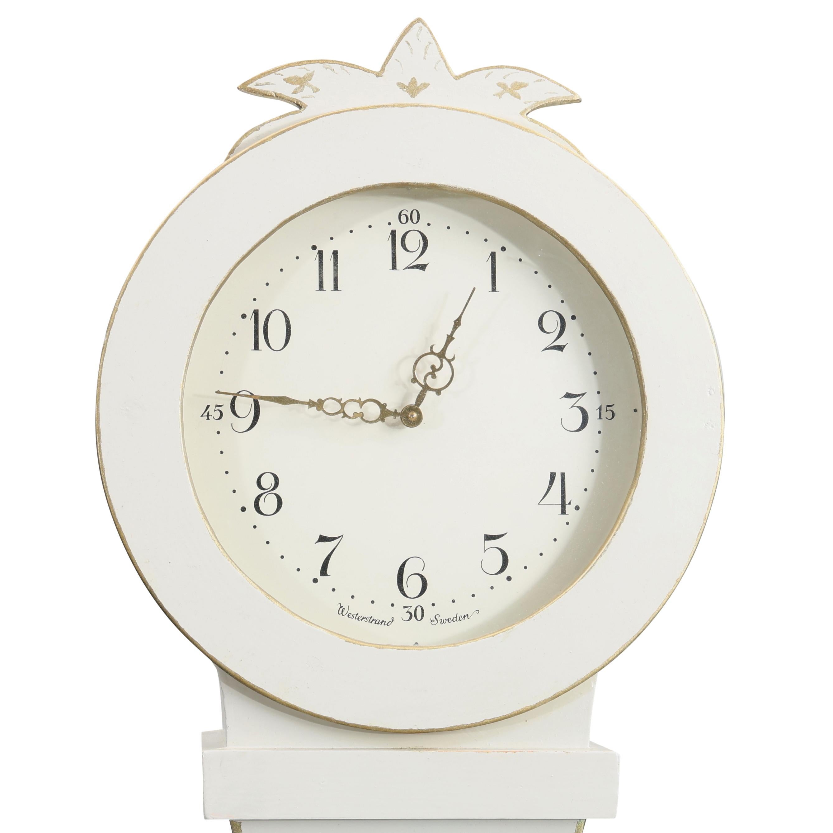 Swedish Mora clock from the 1960's in original colour with painted floral decoration. Working Longcase clock mechanism of pendulum and 2 weights and a bell chime on the hour.

Width: 55cm / 21.7
