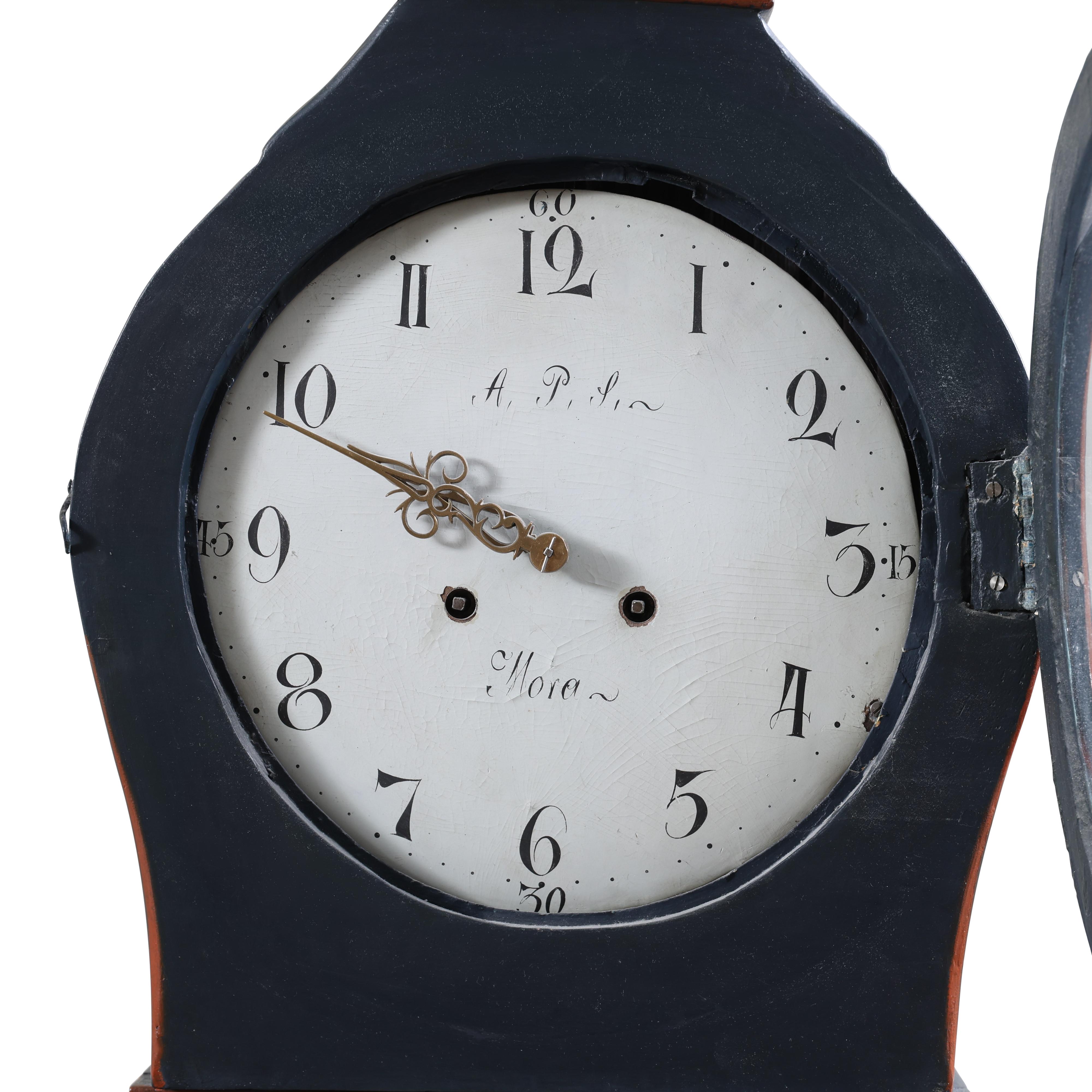 Swedish Mora clock dated 1870 with hand painted Swedish floral details. Inscription inside the clock and initial of clock maker: APL and vilage of Mora. Working Longcase clock mechanism of pendulum and 2 weights and a bell chime on the hour.

Width: