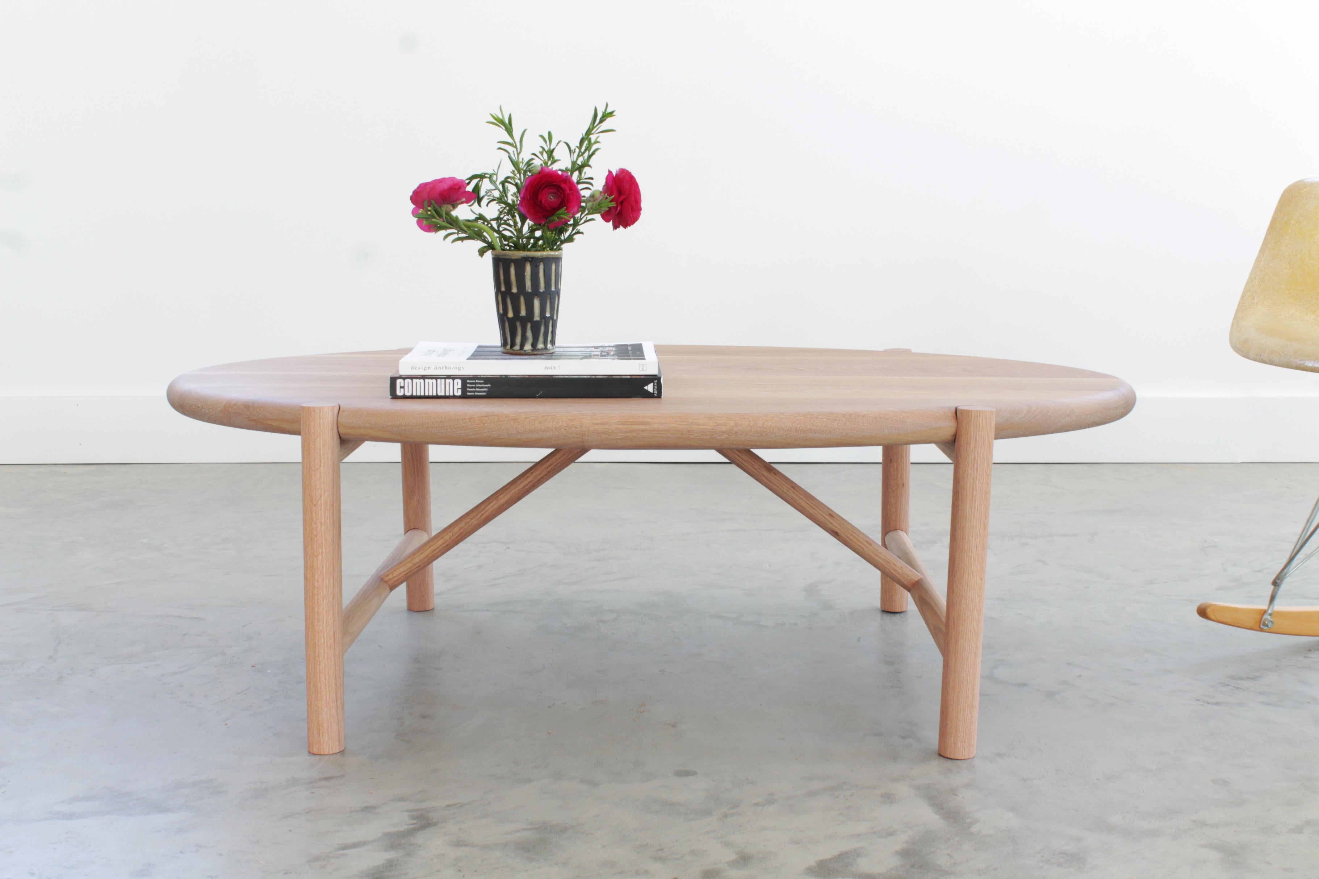 The Mora coffee table easily adapts to the styling of any room with classic joinery and soft lines. It has a solid wood top and mortise and tenon leg structure to give it stability and durability for residential and commercial use.