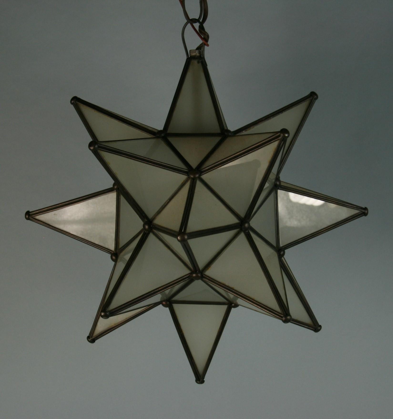 3-809ab Moravian star pendant
Takes one Edison based bulb 60 Watt
2 available
one has stabilized crack in tip of glass see last photo.