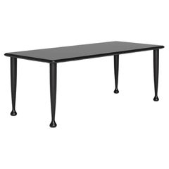 Tavolo Morbio in frassino nero di Achille and Pier Giacomo Castiglioni per Meritalia