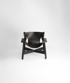 More Burnished wood - Leather Armchair seat by Adriane Escarfullery