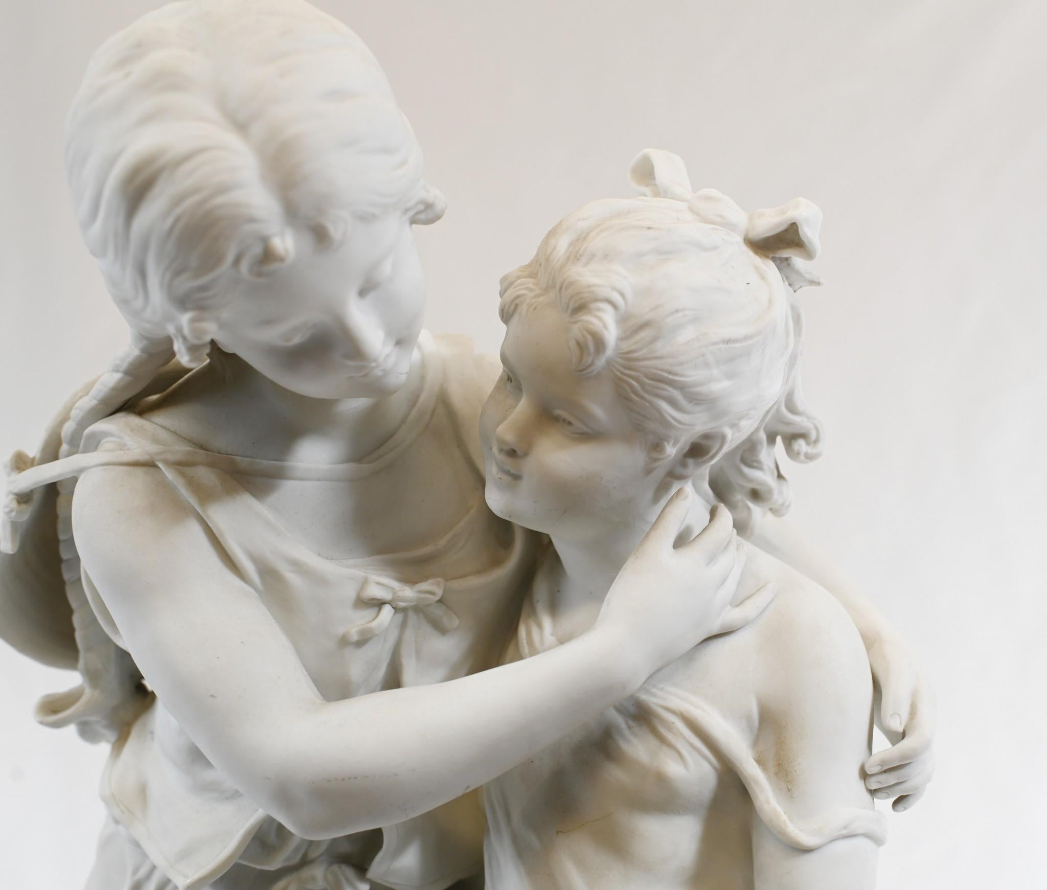 Gorgeous antique French biscuit Parian porcelain statue of a pair of girls
Statue is by August Moreau, the famous French sculpturist and we date this to circa 1880
Parian is made of biscuit porcelain
With its white color, the material makes an