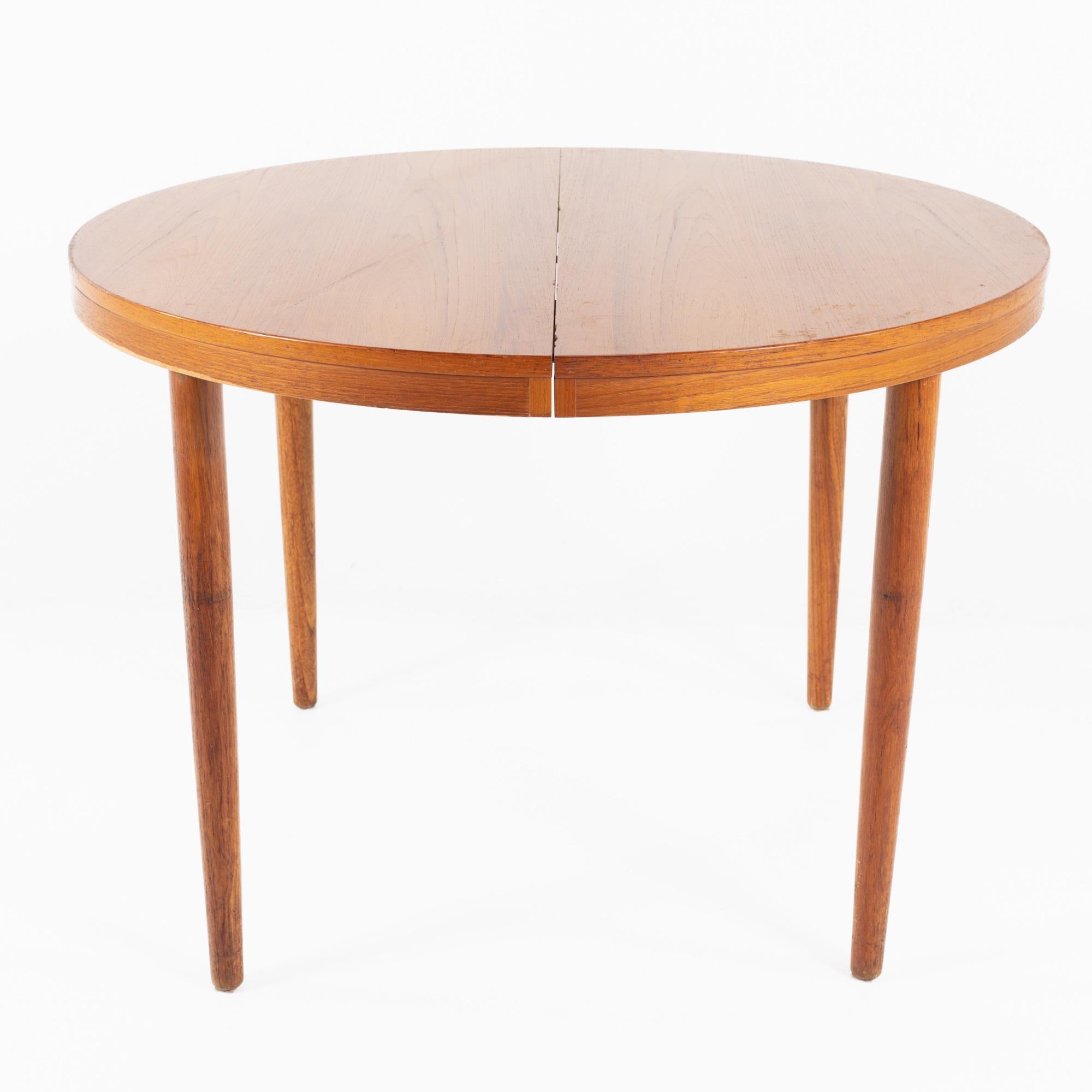Moreddi style mid century danish round teak dining table

This table measures: 41 wide x 41 deep x 29 inches high, with a seat height of 26 inches

All pieces of furniture can be had in what we call restored vintage condition. That means the