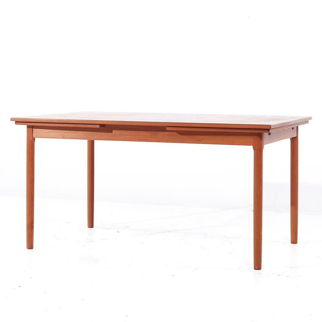 Mid-Century Modern Moreddi Style Mid Century Danish Teak Hidden Leaf Expanding Dining Table (Table de salle à manger à feuilles cachées) en vente