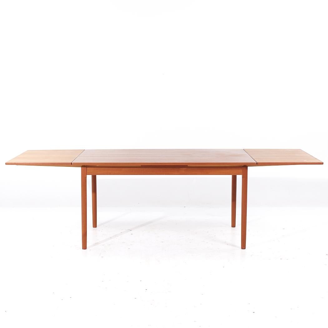 Moreddi Style Mid Century Danish Teak Hidden Leaf Expanding Dining Table (Table de salle à manger à feuilles cachées) en vente 1