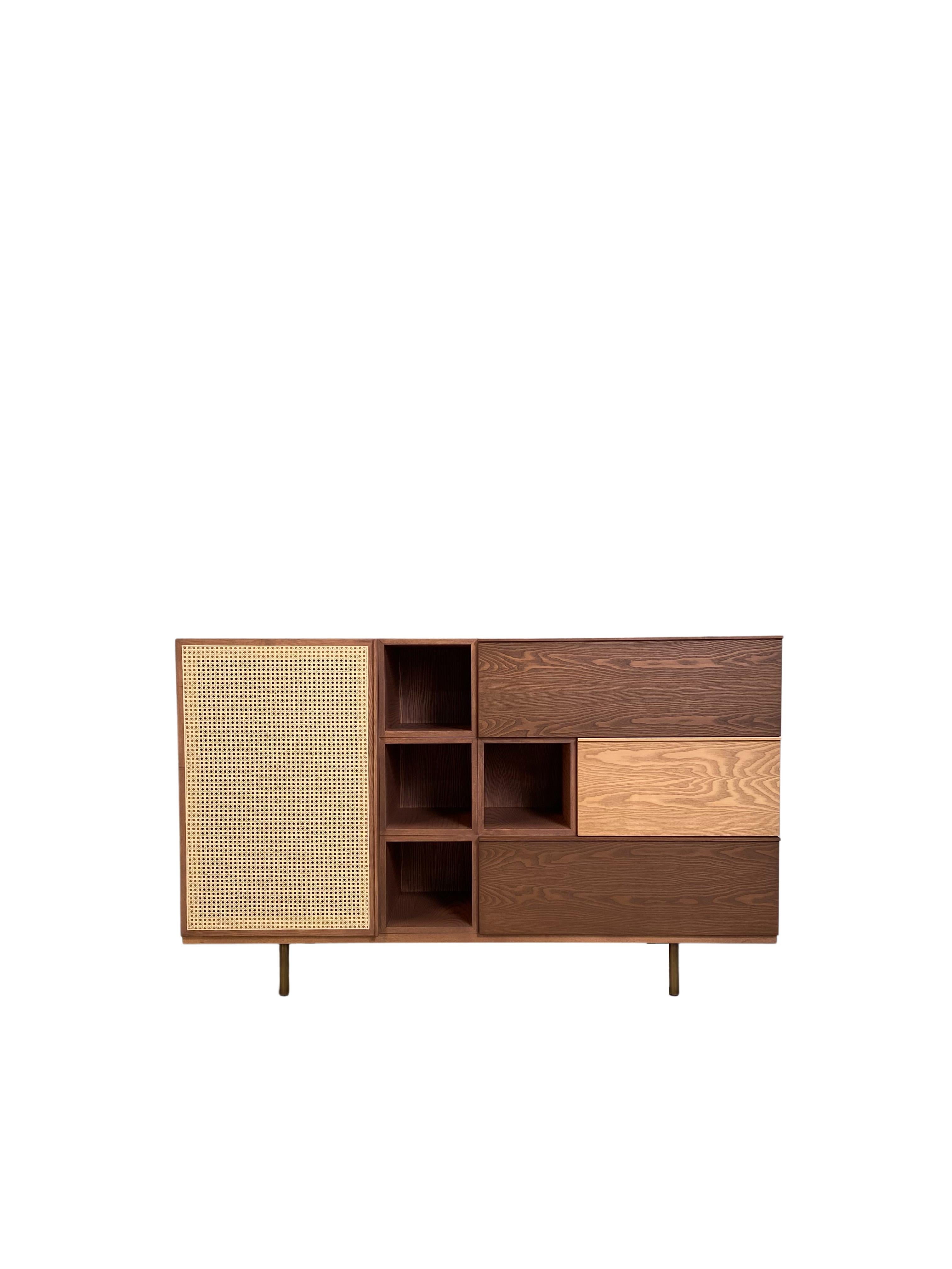 Morelato presents a new modular system with standing or hanging elements of different sizes, suitable to furnish many different spaces. Each element can be open, or with doors or drawers. The structure is made of ash wood in different color stains