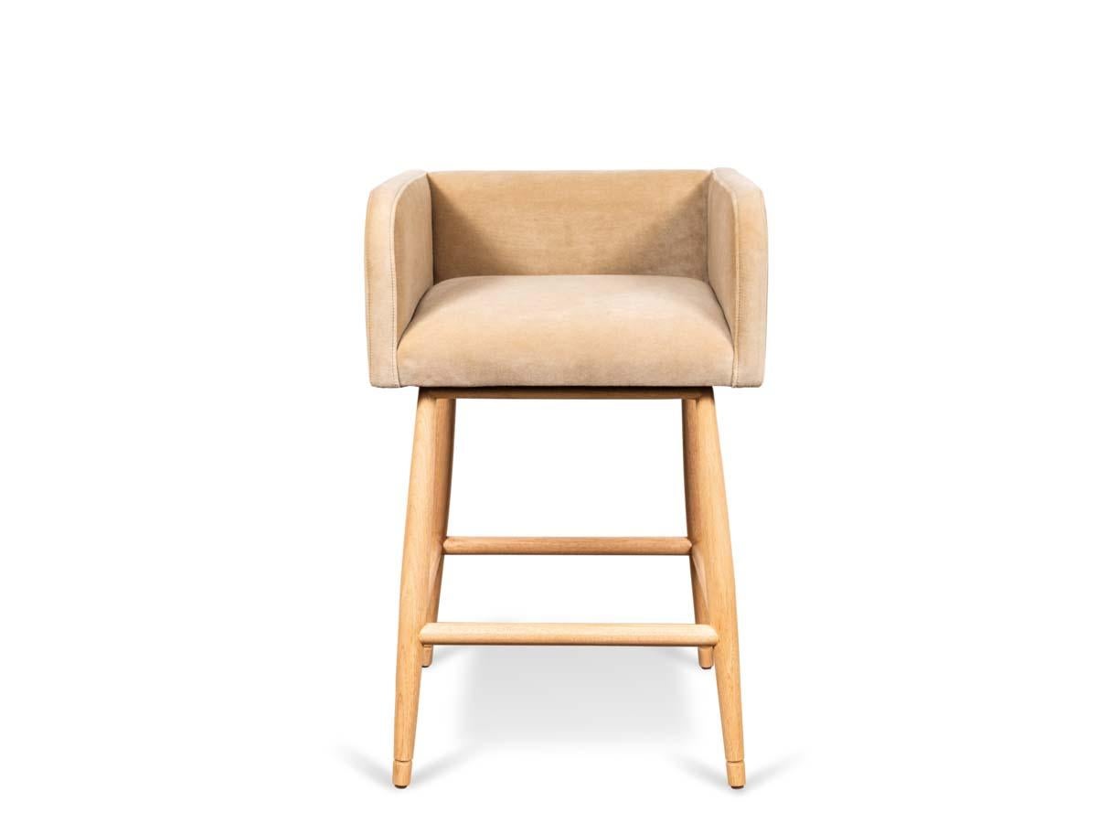 The Moreno barstool sits low with Italian inspired arms and incised details on a solid walnut or oak base. Available to order in counter height. 

The Lawson-Fenning Collection is designed and handmade in Los Angeles, California. Reach out to