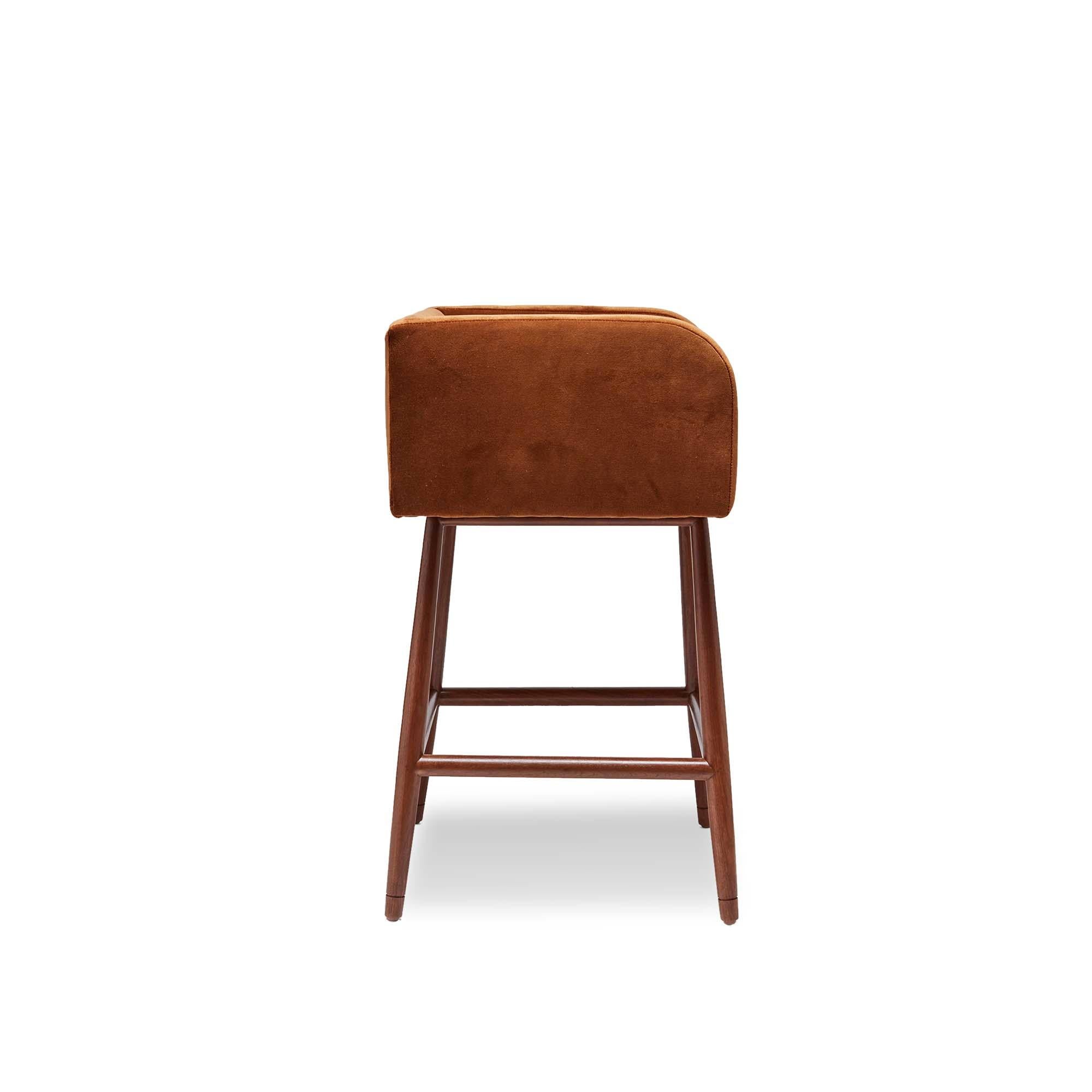 The Moreno Barstool sits low with Italian inspired arms and incised details on a solid walnut or oak base. Available to order in counter height. 

The Lawson-Fenning Collection is designed and handmade in Los Angeles, California. Reach out to