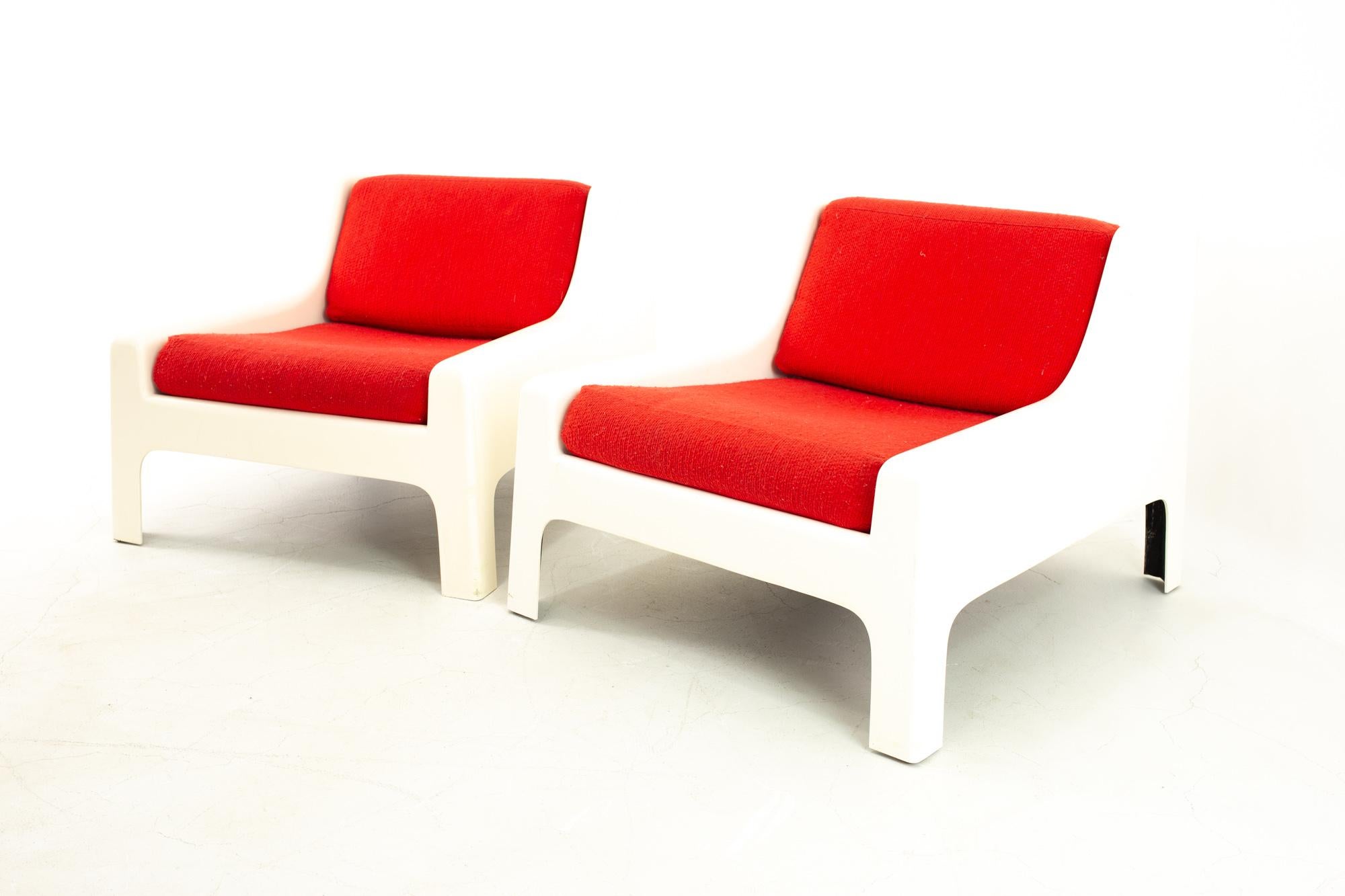 Moretti Mid Century fiberglass lounge chairs - pair
Each chair measures: 31 wide x 35.25 deep x 25.5 high, with a seat height of 15.5 and arm height of 16 inches

Each piece of furniture is available in what we call restored vintage condition. Upon