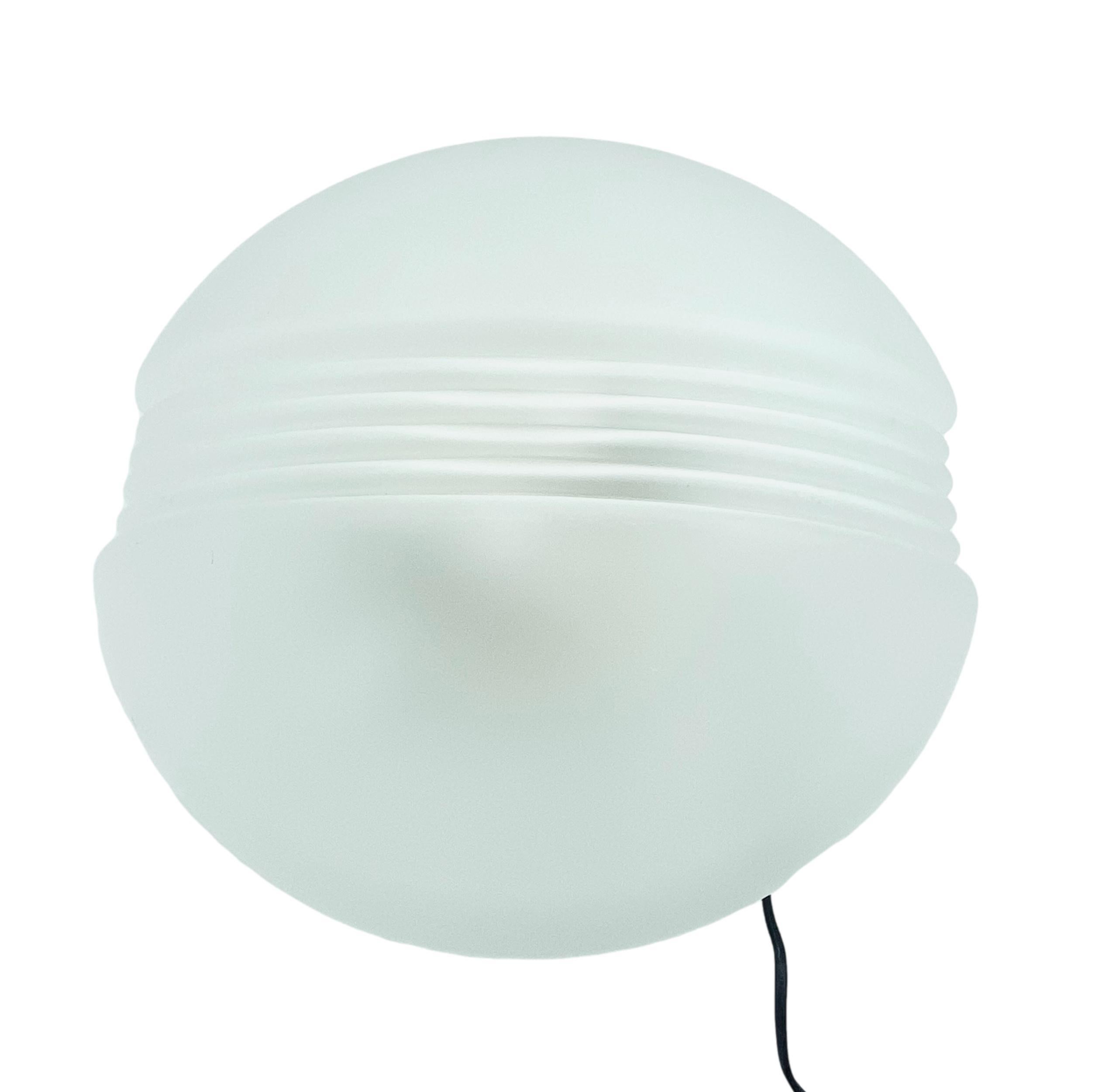 Handcrafted glass ceiling light for installation and wall or ceiling. The diffuser consists of a single polished piece with a rounded shape. The shape of the satin-blown glass diffuser makes it perfect for ambient lighting.


