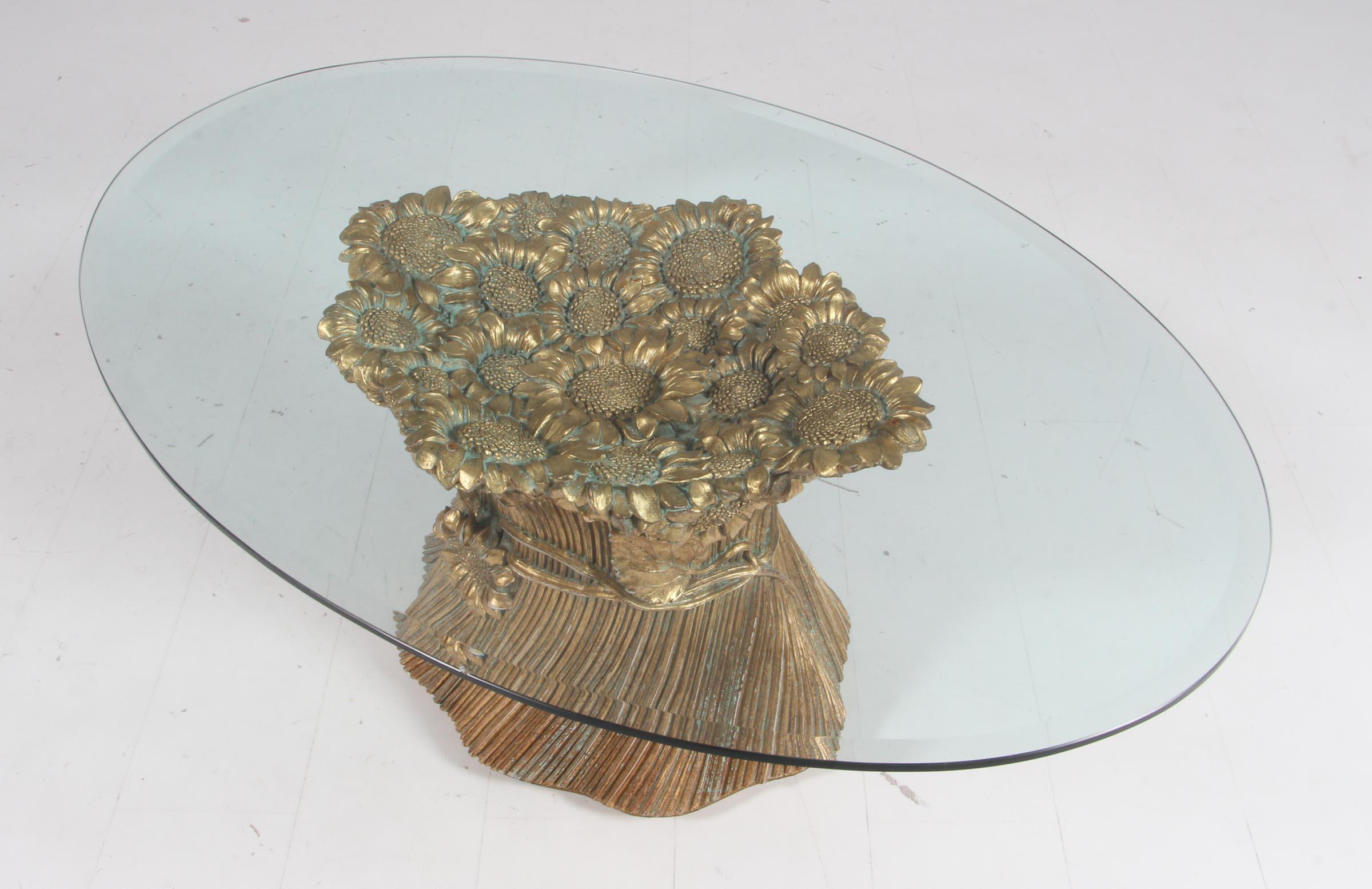 Morex coffee table in gold plated wood with floral decorations.

Glass top.

Made by Morex in the 1950s