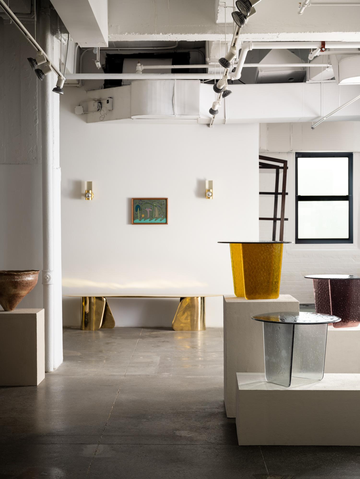 Morfa is the debut collection by contemporary designer Lucas Recchia, offering a poetic exploration of transformation through the medium of glass, bronze and patina. With Morfa, Recchia challenges conventional perceptions of bronze as a rigid,