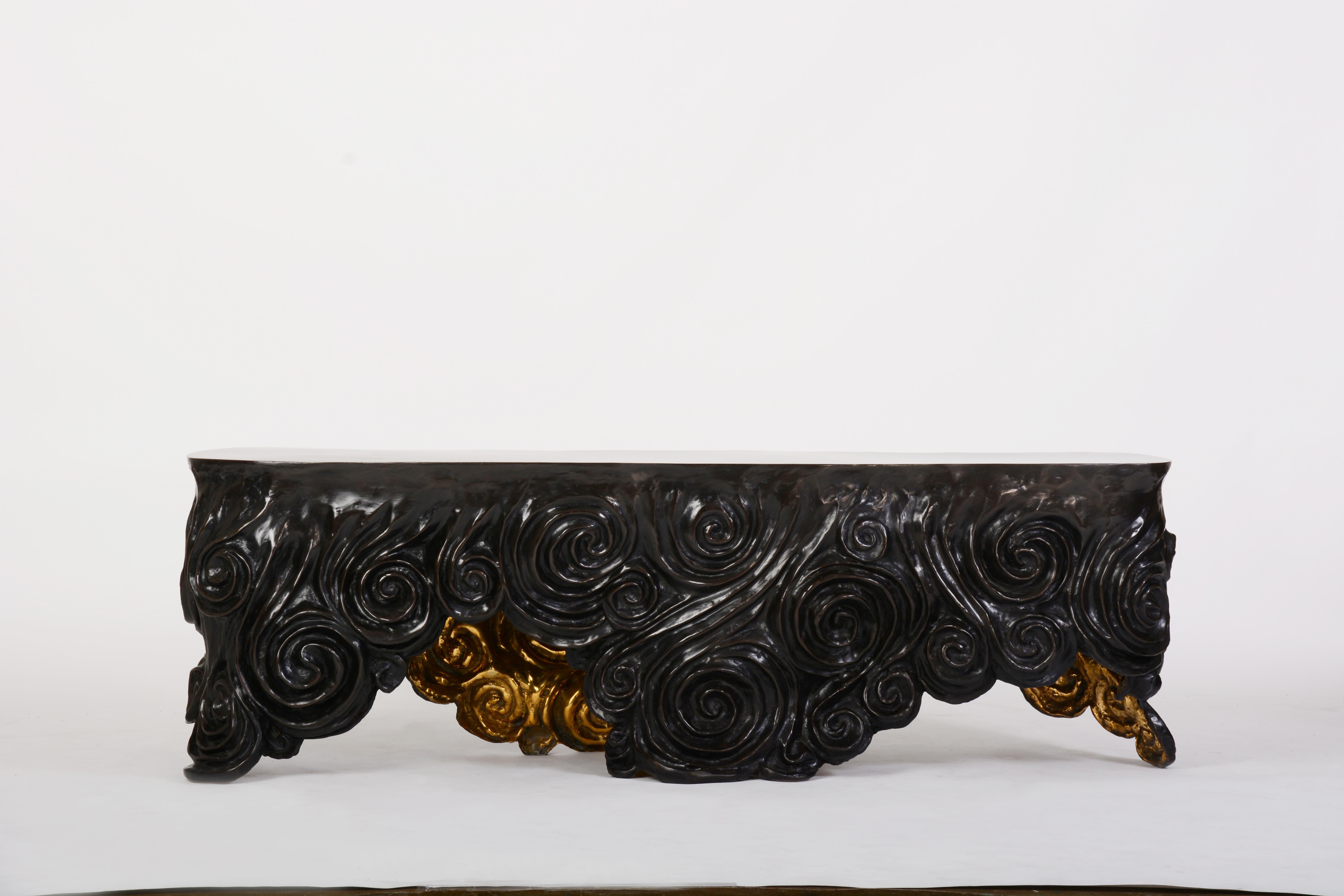 Morgan Bench in Cast Bronze from Elan Atelier

The Morgan bench is cast using the lost wax method in solid bronze with the Chinese Cloud pattern. The exterior finish is antique bronze and the interior finish is polished gold bronze. Bespoke sizes