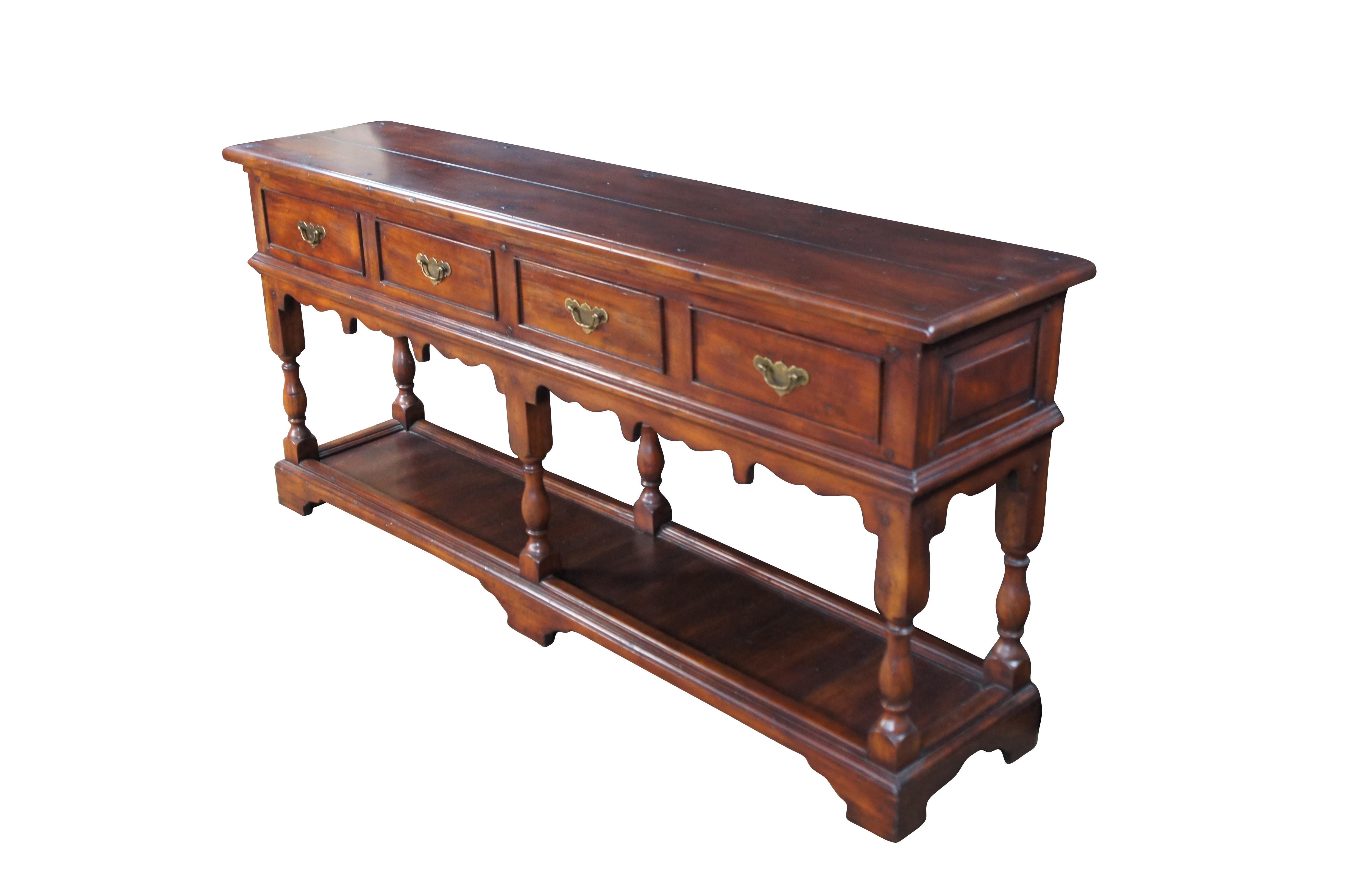 Vintage Morgan Hill Georgian Style country farmhouse sideboard / potboard / buffet / credenza / console or sofa table.  Made of cherry featuring a tiered low profile design with four drawers, serpentine apron, turned legs and lower shelf over