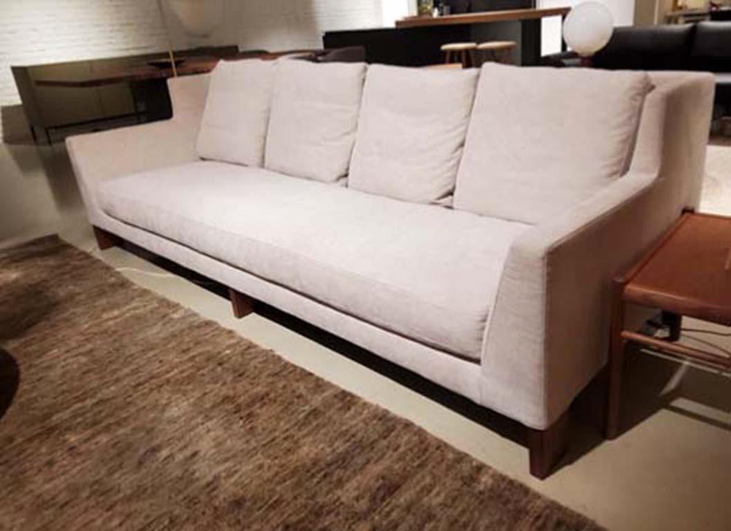 Morgan modern sofa is a classic modern sofa. With a high back, down seat, and wooden feet, the Morgan is a comfortable place to hide away.

Additional information:
- Dimensions: D. 1000 x W. 272 x H. 83 cm. 

Morgan modern sofa, by Niels