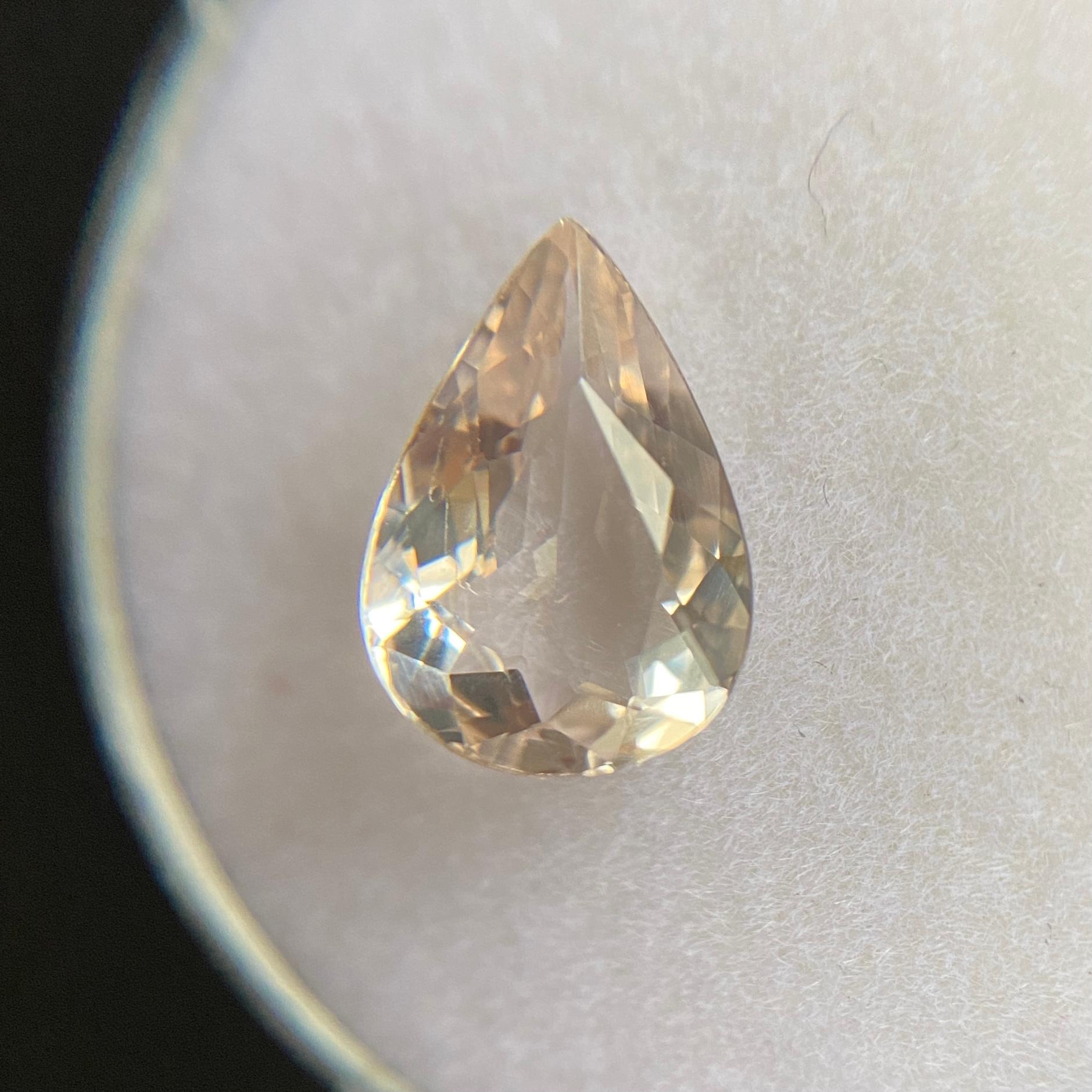 Fine Natural Morganite Gemstone.

1.45 Carat with a beautiful pink orange (peach) colour and excellent clarity. Very clean stone.

Also has an excellent pear/teardrop cut with good proportions and symmetry with an ideal polish to show great shine