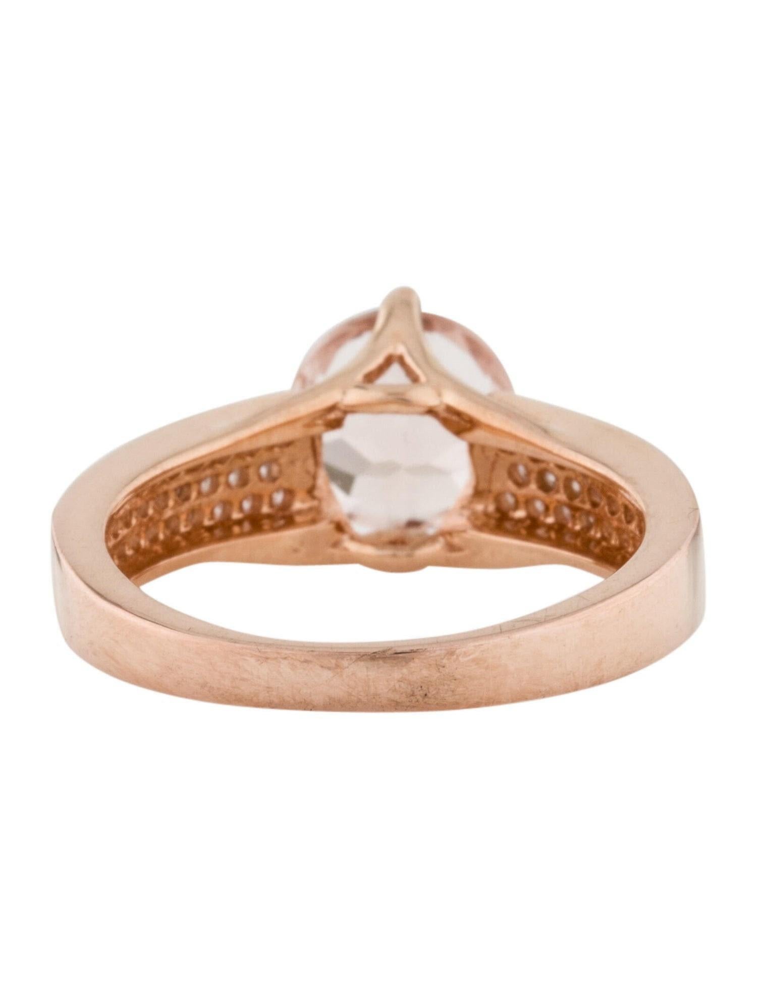 This is a gorgeous natural 1.77 morganite and diamond ring set in solid 14k rose gold. The natural round cut morganite (AAA quality gem) has an excellent peachy pink color and is surrounded by a halo of round-cut white diamonds. The ring is stamped