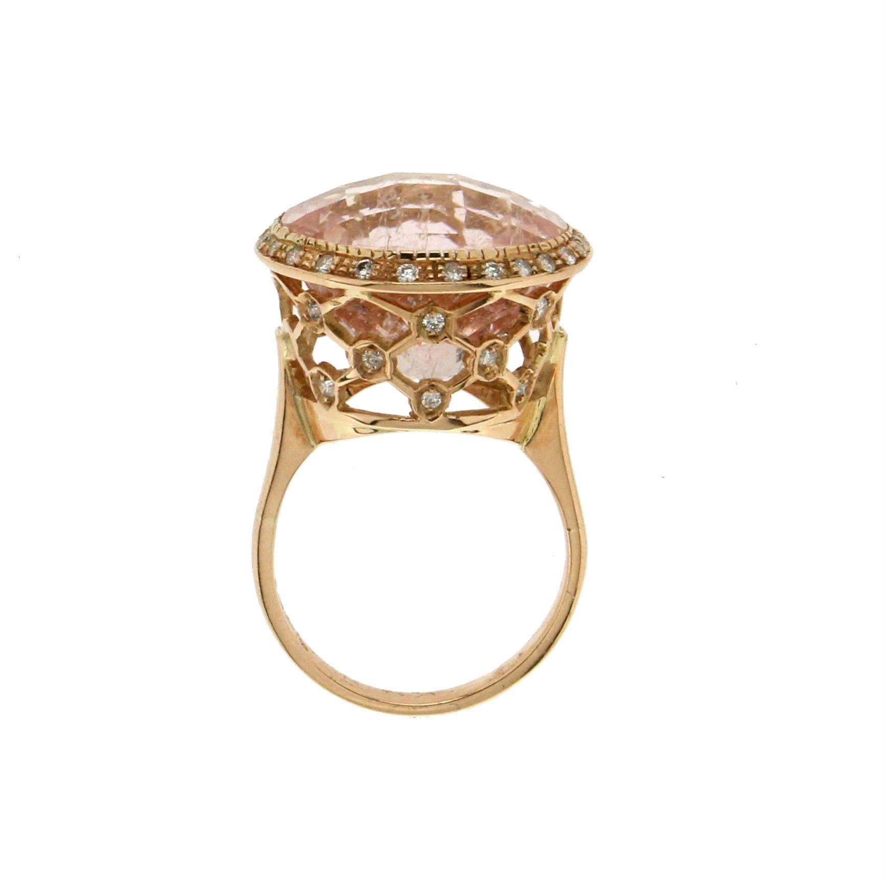 Fantastic 18 karat yellow gold ring mounted with morganite and diamonds

Ring Weight 11.80 grams
Diamonds Weight 0.51 karat
Morganite 24.29 karat
Ring Size 8.5 us
Diameter 1,85 cm 0,72 inch 
