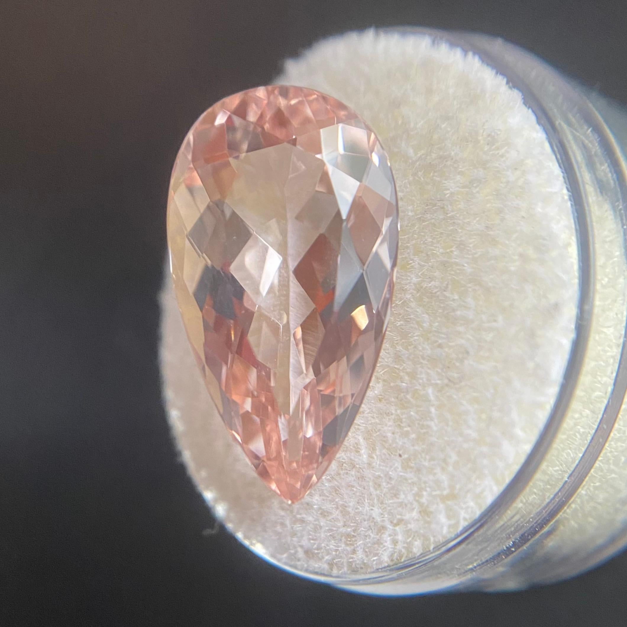 Fine Natural Morganite Gemstone. 

9.35 Carat with a beautiful pink orange (peach) colour and excellent clarity. Very clean stone.

Also has an excellent pear/teardrop cut with good proportions and symmetry with an ideal polish to show great shine