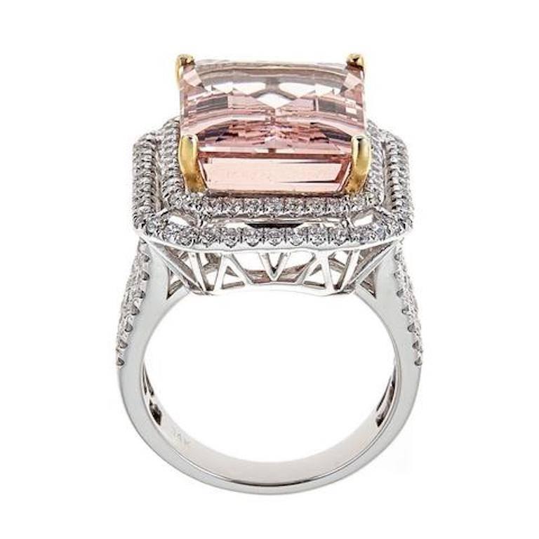 handmade 14k white gold ring with a cushion cut 16.8 carats Morganite stone in the center and approximately 1.95 carats in brilliant round diamonds.