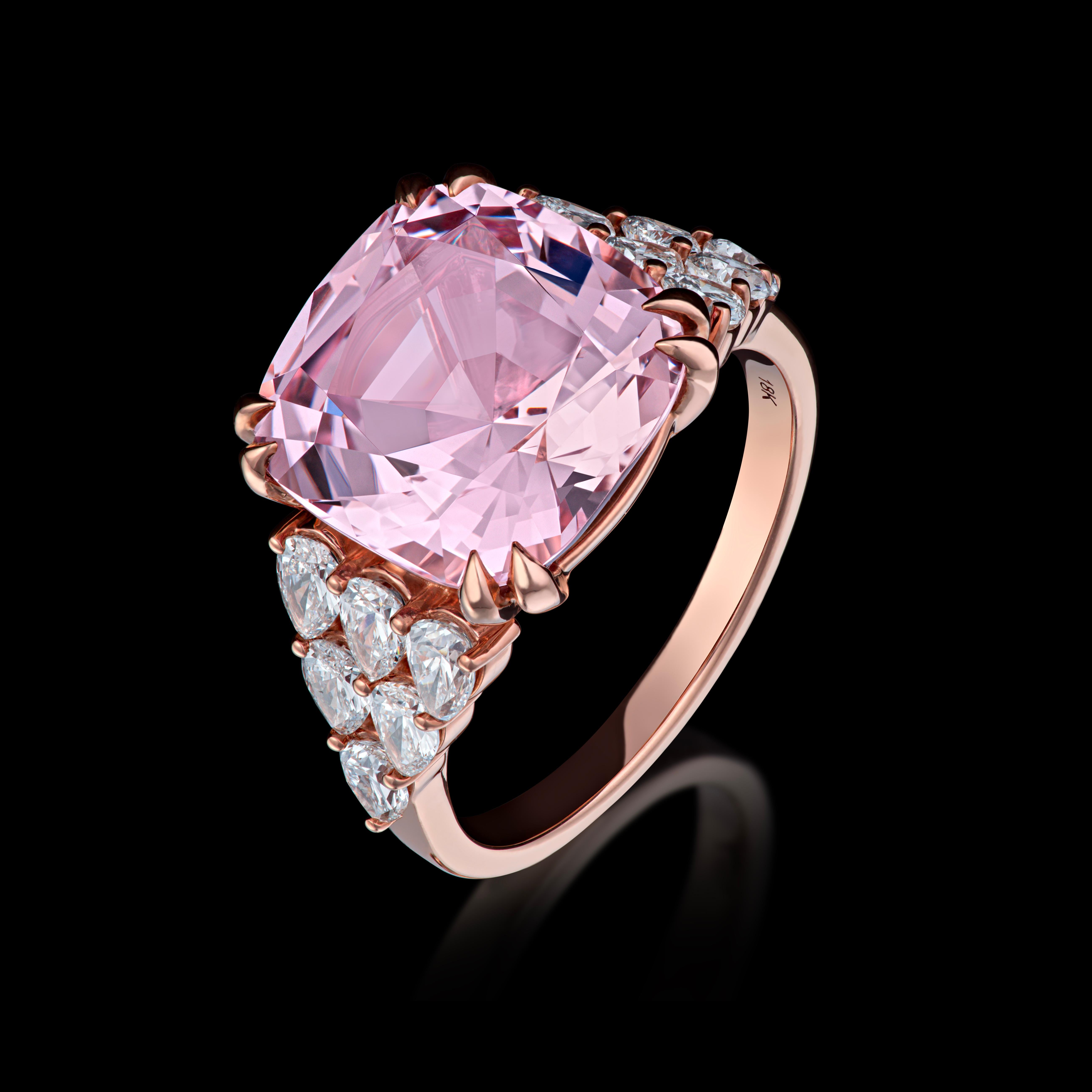 7.09 carat morganite (pink) and diamond cocktail ring. Flawless central cushion cut morganite flanked by 12 pear shaped diamonds of fine quality set in 18K Rose Gold.
