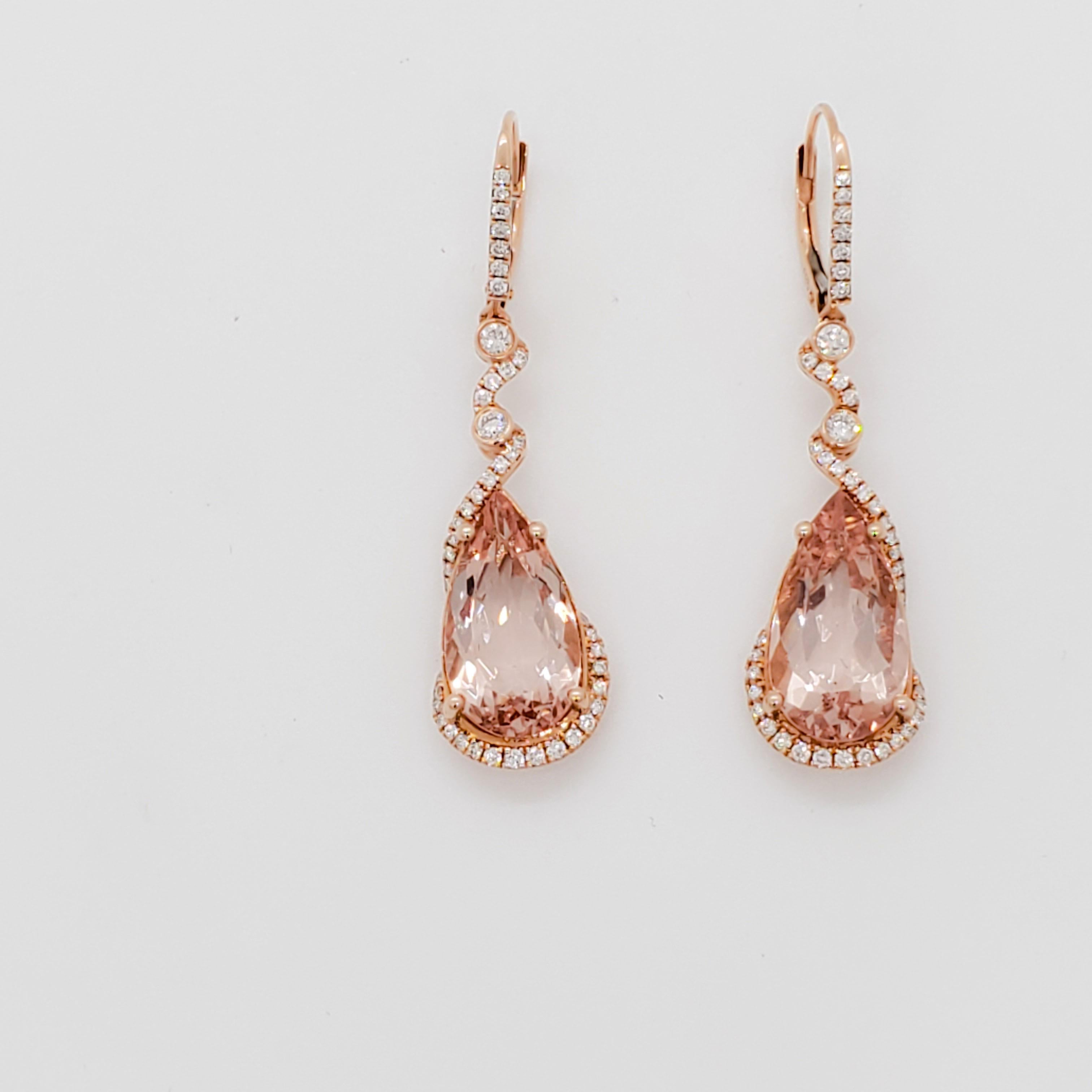 Gorgeous 9.54 ct. morganite pear shapes with 0.75 ct. good quality, white, and bright diamond rounds.  Handmade in 14k rose gold.  These earrings are classy and chic.