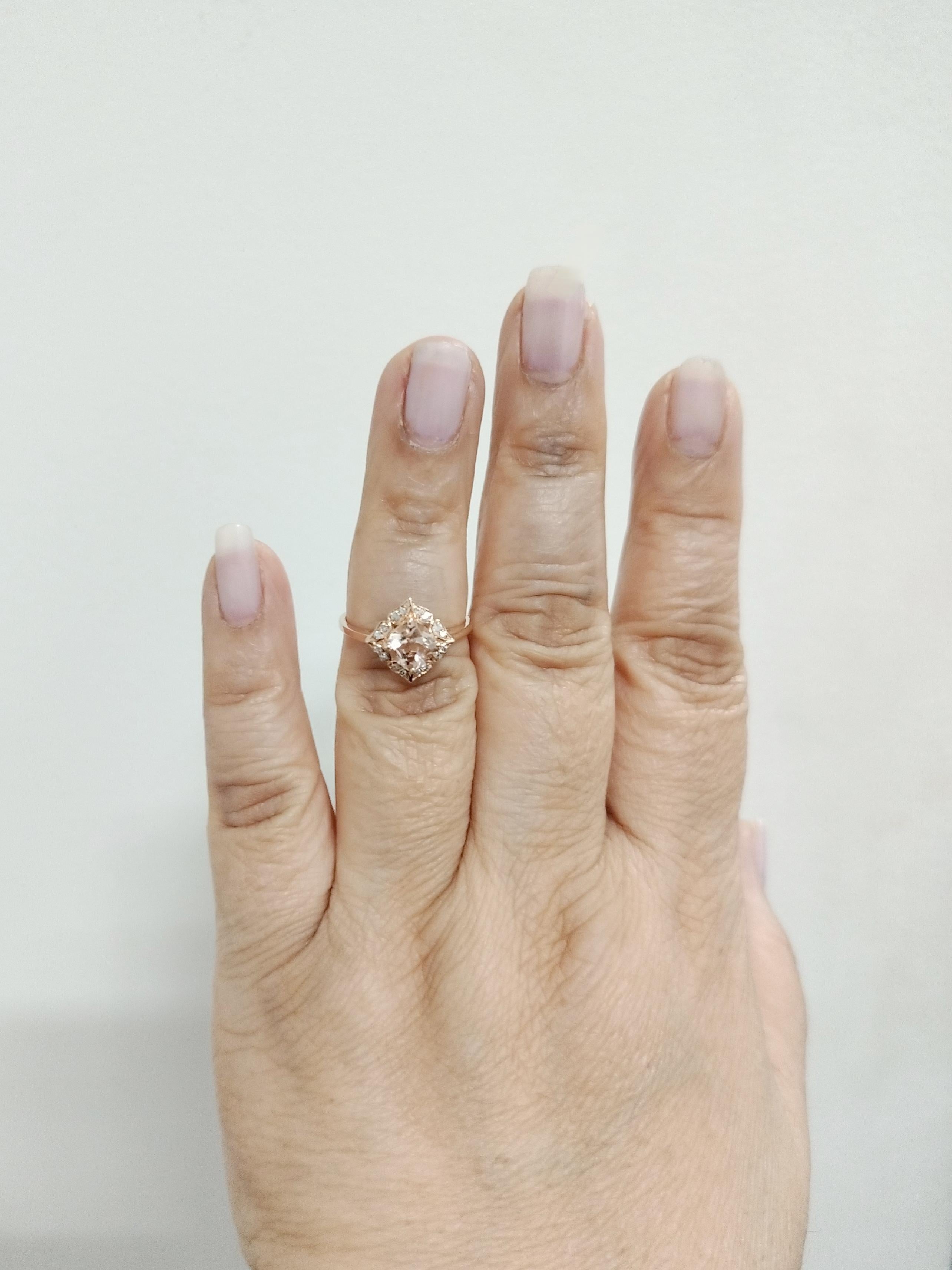 Beautiful 1.00 ct. morganite square cushion with 0.10 ct. good quality white diamond rounds.  Handmade in 14k rose gold.  Ring size 7.