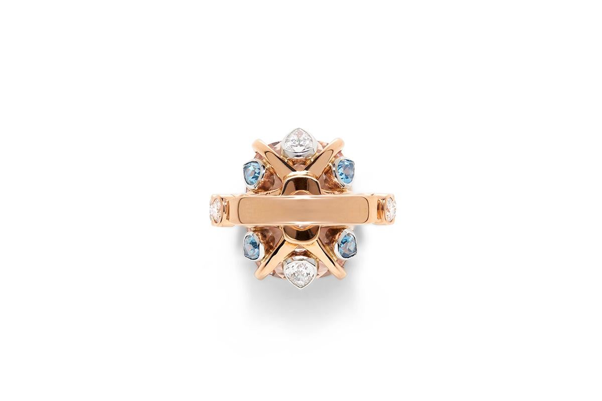 18 Carat Gold Morganite, Aquamarine and White Diamond Cocktail Engagement Ring

Blossom Collection, Morganite, Aquamarine and Diamond Ring. The Blossom Collection coloured gemstones are a uniquely designed cut of an oval cushion cut top with a high