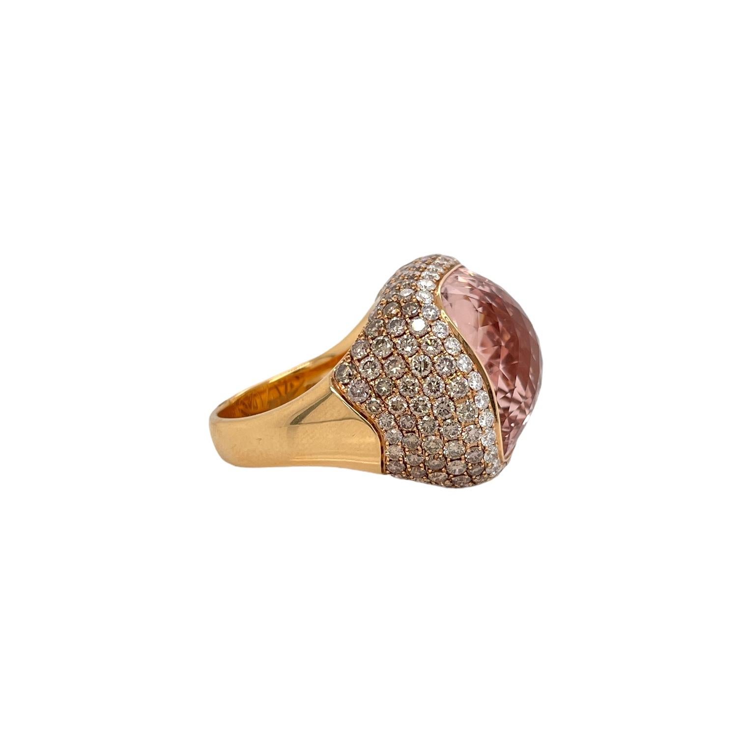 Morganite & champagne diamond cocktail ring 18k rose gold. Ring contains 1 large checkerboard cut cushion shape morganite, 20.92ct. Center stone is accented by round champagne diamonds, 3.80tcw and white round brilliant diamonds, 0.72tcw. Morganite