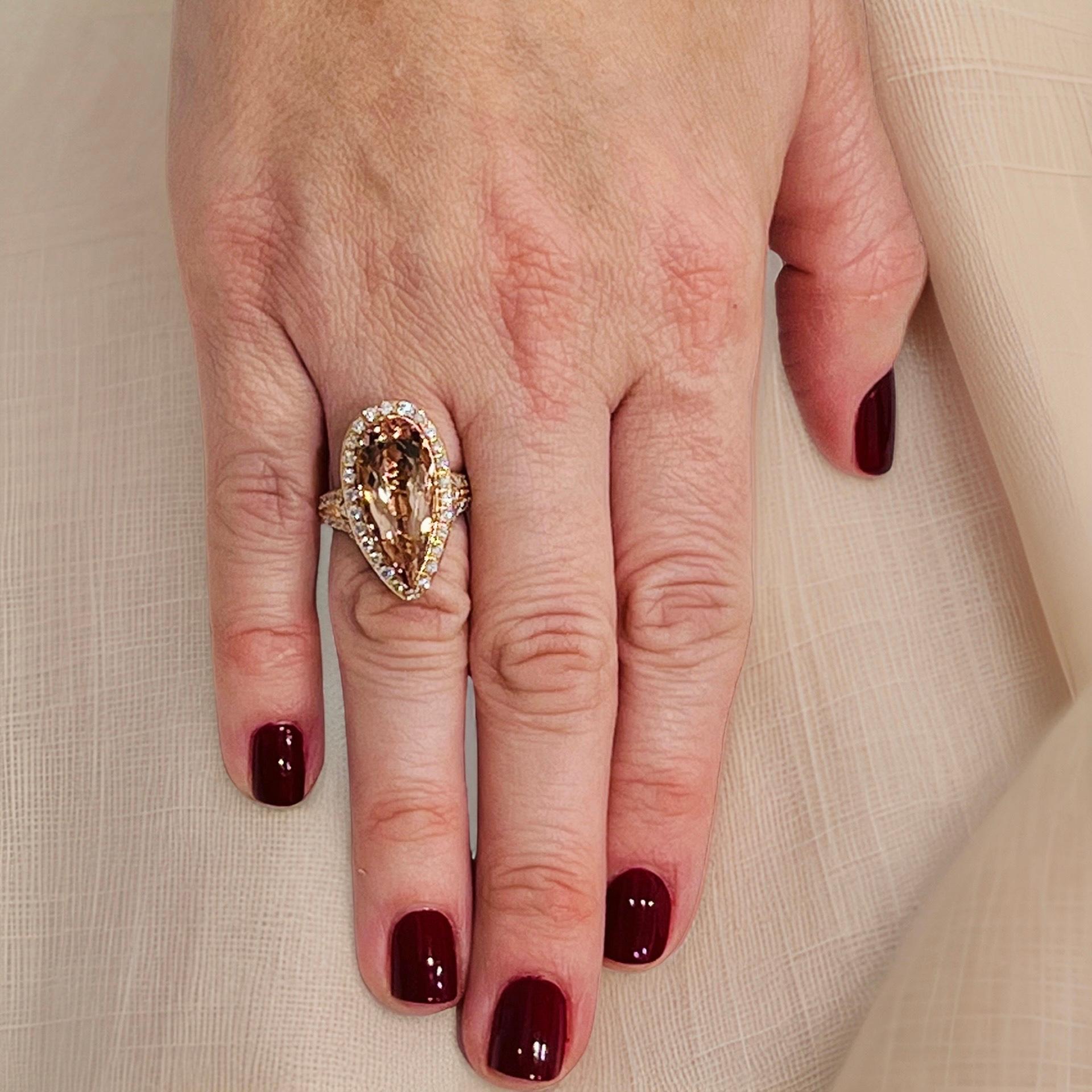 Magnificent Large Pear Morganite and Diamond Ring set in 14 KT with a total carat weight of 6.91 TCW

Certified $5,950 016633

Nothing says, “I Love you” more than Diamonds and Pearls!

This item has been Certified, Inspected, and Appraised by