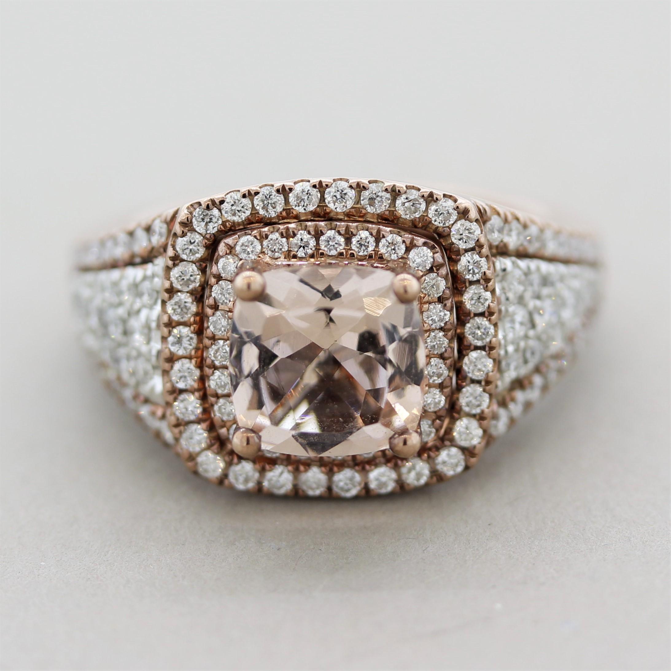 A special ring made in rose gold! It features a 2.05 carat cushion shaped morganite with the traditional soft pastel pink color. It is accented by 1.18 carats of round brilliant-cut diamonds which are set on the shoulders of the ring as well as