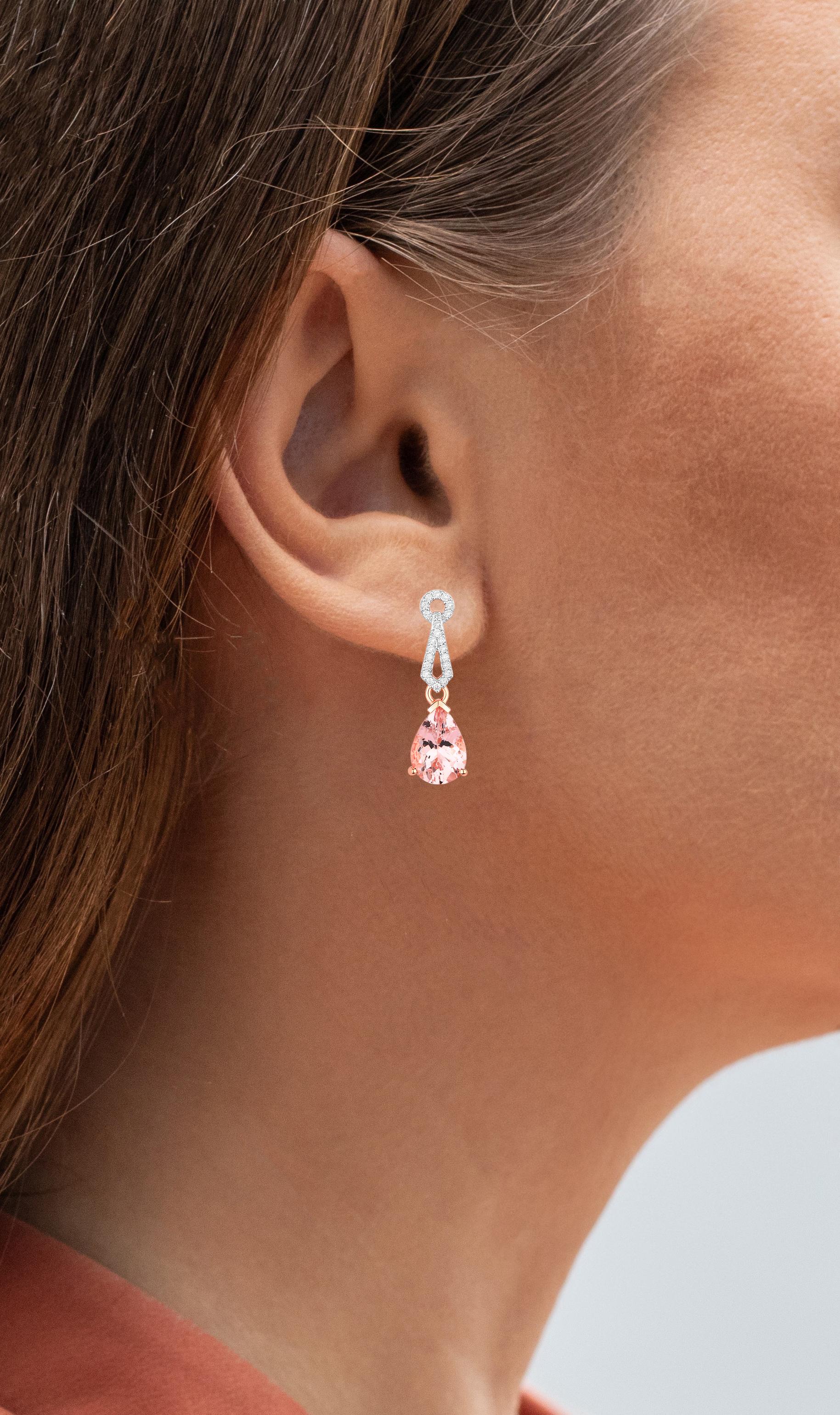 It comes with the Gemological Appraisal by GIA GG/AJP
All Gemstones are Natural
2 Morganites = 3.41 Carats
Cut: Pear
44 Round Diamonds = 0.20 Carats
Metal: 14K Rose Gold
Dimensions: 25 x 8 mm