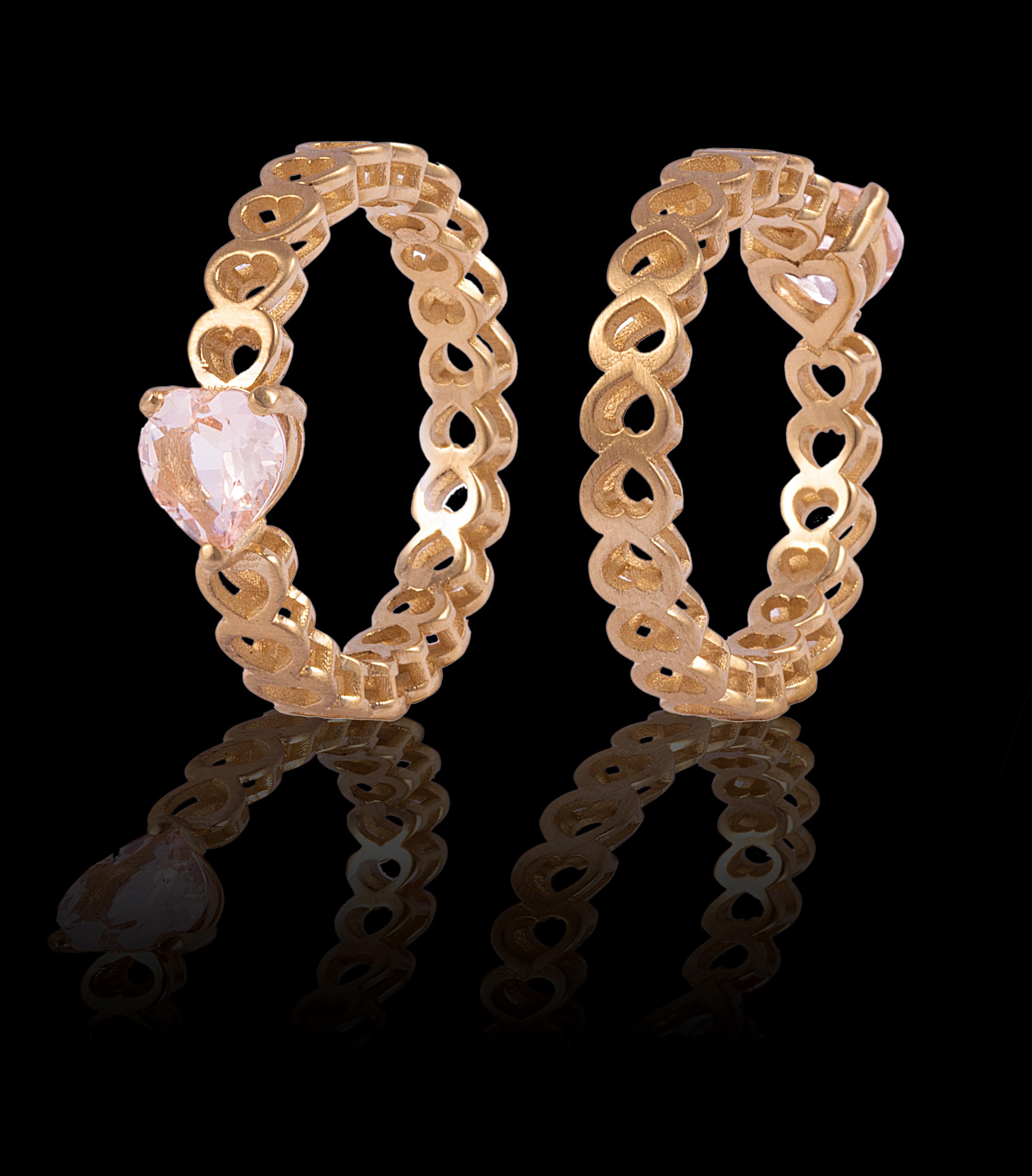 Let the romantic pale pink heart set in satin finished 14k gold adorn you hand. The stone (our largest) is 6mm set in our iconic hearts shank. Available in yellow gold, white gold, and rose gold. Let us know what size you want.
                     