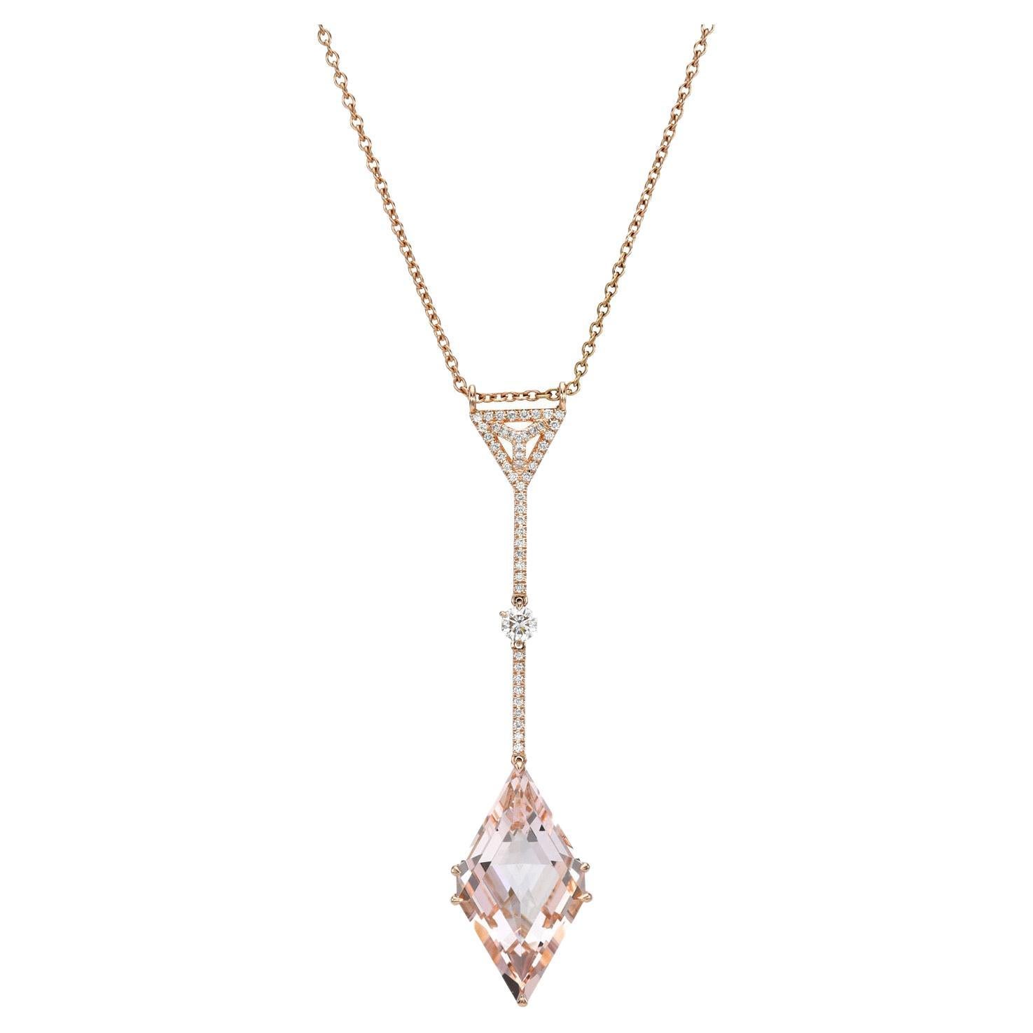 Exclusive 7.66 carat Morganite Kite, 18K rose gold necklace, suspending from a 0.16 carat three dimensional signature Merkaba diamond triangle, and a single round diamond weighing a total of 0.15 carats.
Total length of the necklace can be enjoyed