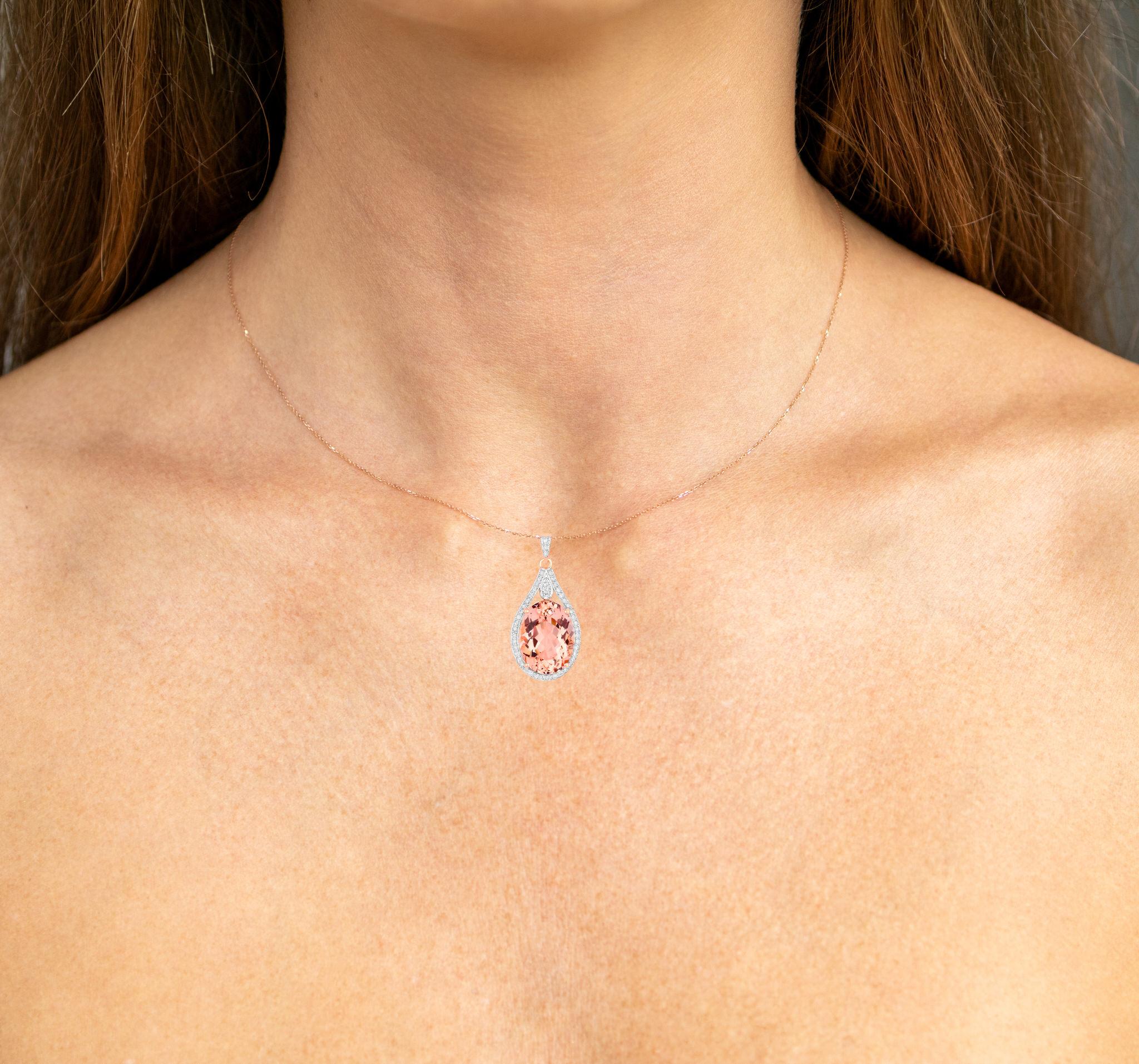 It comes with the Gemological Appraisal by GIA GG/AJP
All Gemstones are Natural
Oval Morganite = 8.90 Carat
47 Round Diamonds = 0.41 Carats
Metal: 14K Rose Gold
Pendant Dimensions: 32 x 15 mm
