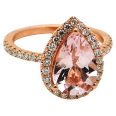 Anello Morganite Peach Diamond in oro 18KT con design Fleur De Lis e diamanti canadesi