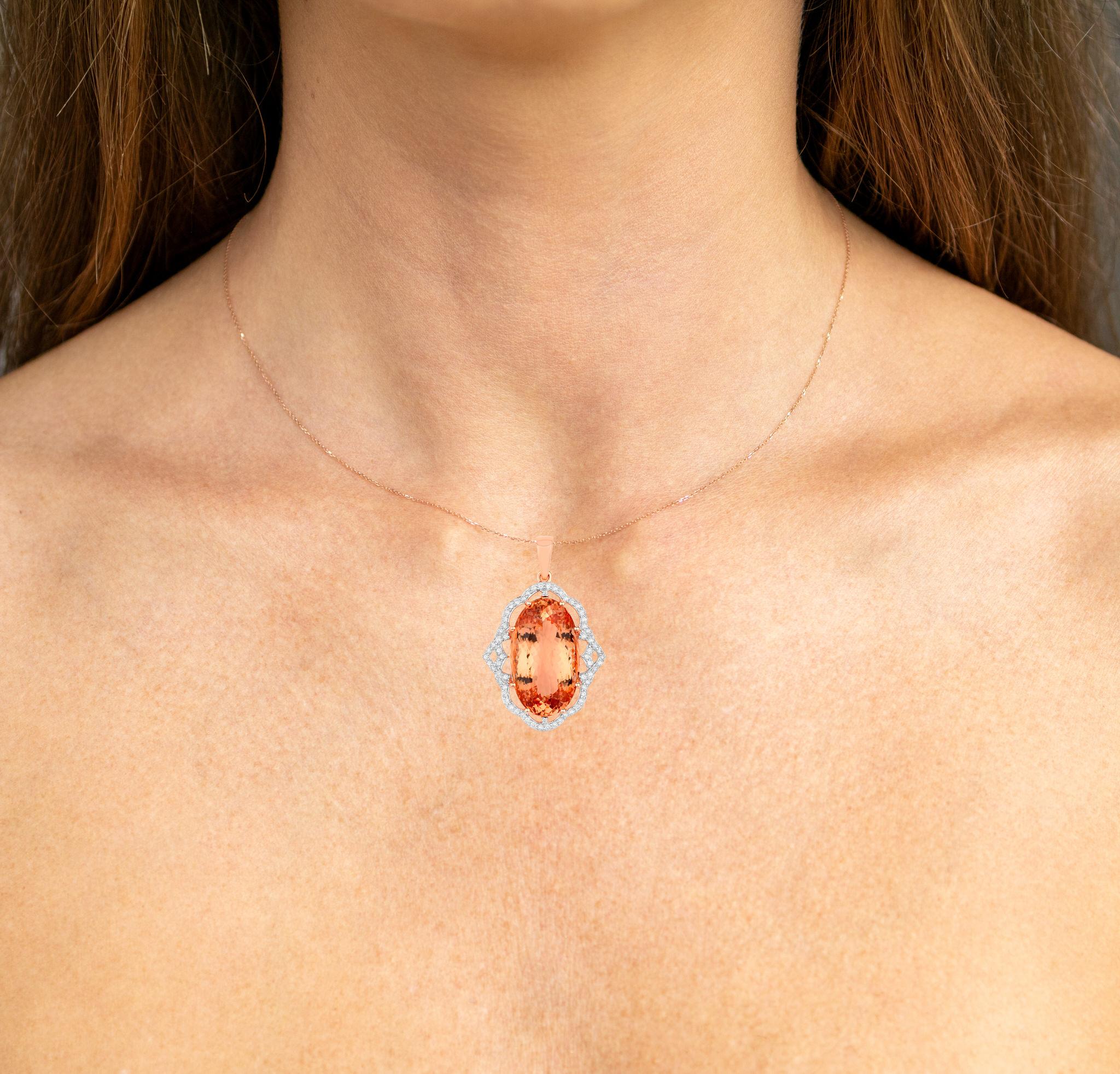It comes with the Gemological Appraisal by GIA GG/AJP
All Gemstones are Natural
Morganite = 26.58 Carats
66 Round Diamonds = 0.70 Carats
Metal: 14K Rose Gold
Pendant Dimensions: 42 x 27 mm
Chain Included: 14K Rose Gold
Chain Length: 16 Inches