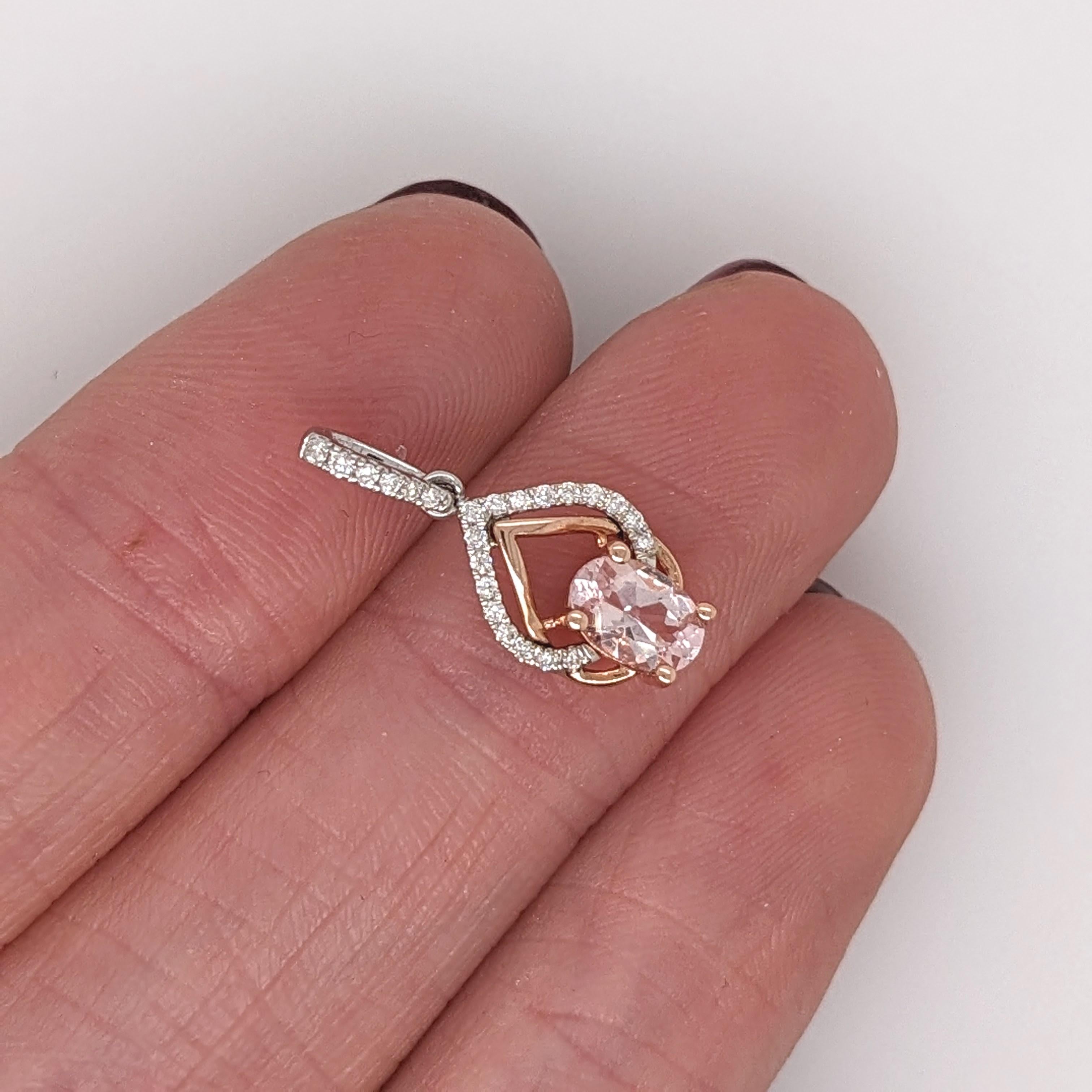 This beautiful pendant features a 0.40 carat oval morganite gemstone with natural earth mined diamonds all set in solid 14K dual - rose and white gold. This pendant makes a lovely June birthstone gift for your loved ones! 

Specifications

Item