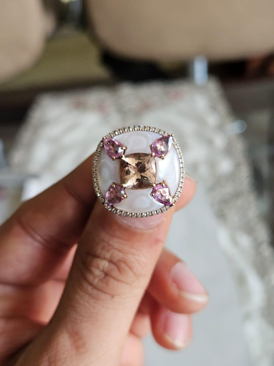 A very gorgeous and beautiful, modern style, Morganite, Pink Sapphires & Mother of Pearls Cocktail Ring set in 18K White Gold & natural Diamonds. The weight of the Morganite is 1.97 carats. The weight of the Pink Sapphires is 0.93 carats. The Pink