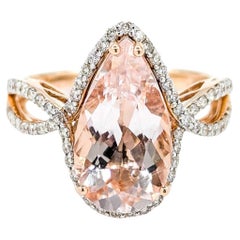 Anillo de Morganita en Oro Rosa de 14k con Halo de Vástago Torcido