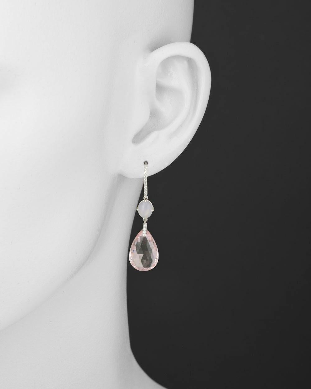 Morganite, star sapphire and diamond drop earrings in 18k white gold.

Two briolette-shaped morganites weighing 19.98 total carats
Two star sapphires weighing 2.87 total carats
32 round-cut diamonds weighing 0.32 total carats
